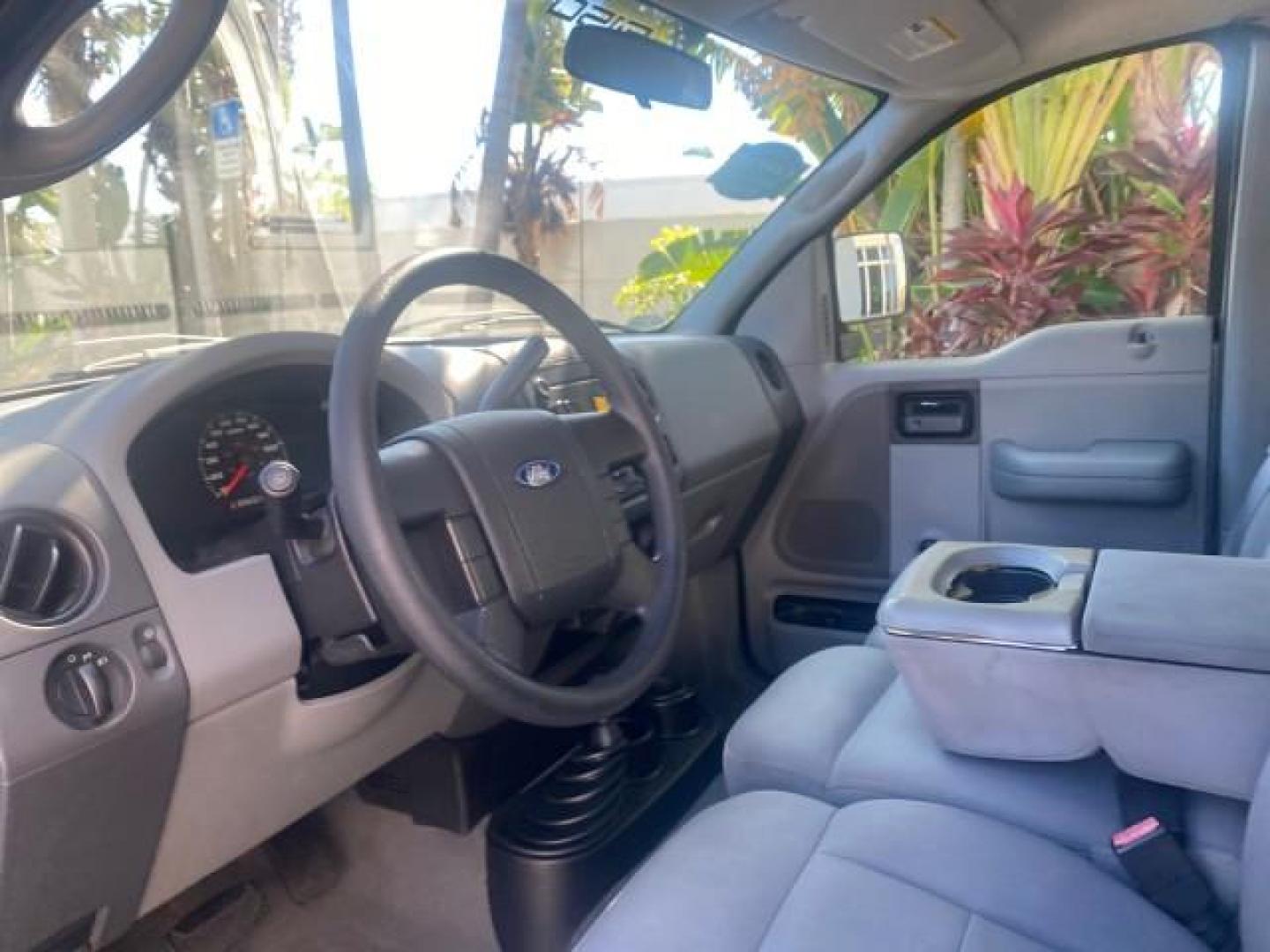 2004 Black /Flint Ford F-150 STX LOW MILES 46,755 4WD (1FTRF14W54N) with an 4.6L EFI V8 Engine engine, Automatic transmission, located at 4701 North Dixie Hwy, Pompano Beach, FL, 33064, (954) 422-2889, 26.240938, -80.123474 - OUR WEBPAGE FLORIDACARS1.COM HAS OVER 100 PHOTOS AND FREE CARFAX LINK 2004 FORD F-150 STX 4WD WE HAVE THE LOWEST MILEAGE ONE FOR SALE IN THE COUNTRY 46,755 VIN: 1FTRF14W54NB29502 1 F T R F 1 4 W 5 4 N B 2 9 5 0 2 PICKUP 4.6L V8 F SOHC 16V GASOLINE 18 MPG REAR WHEEL DRIVE W/ 4X4 Features 4WD/AWD ABS - Photo#46