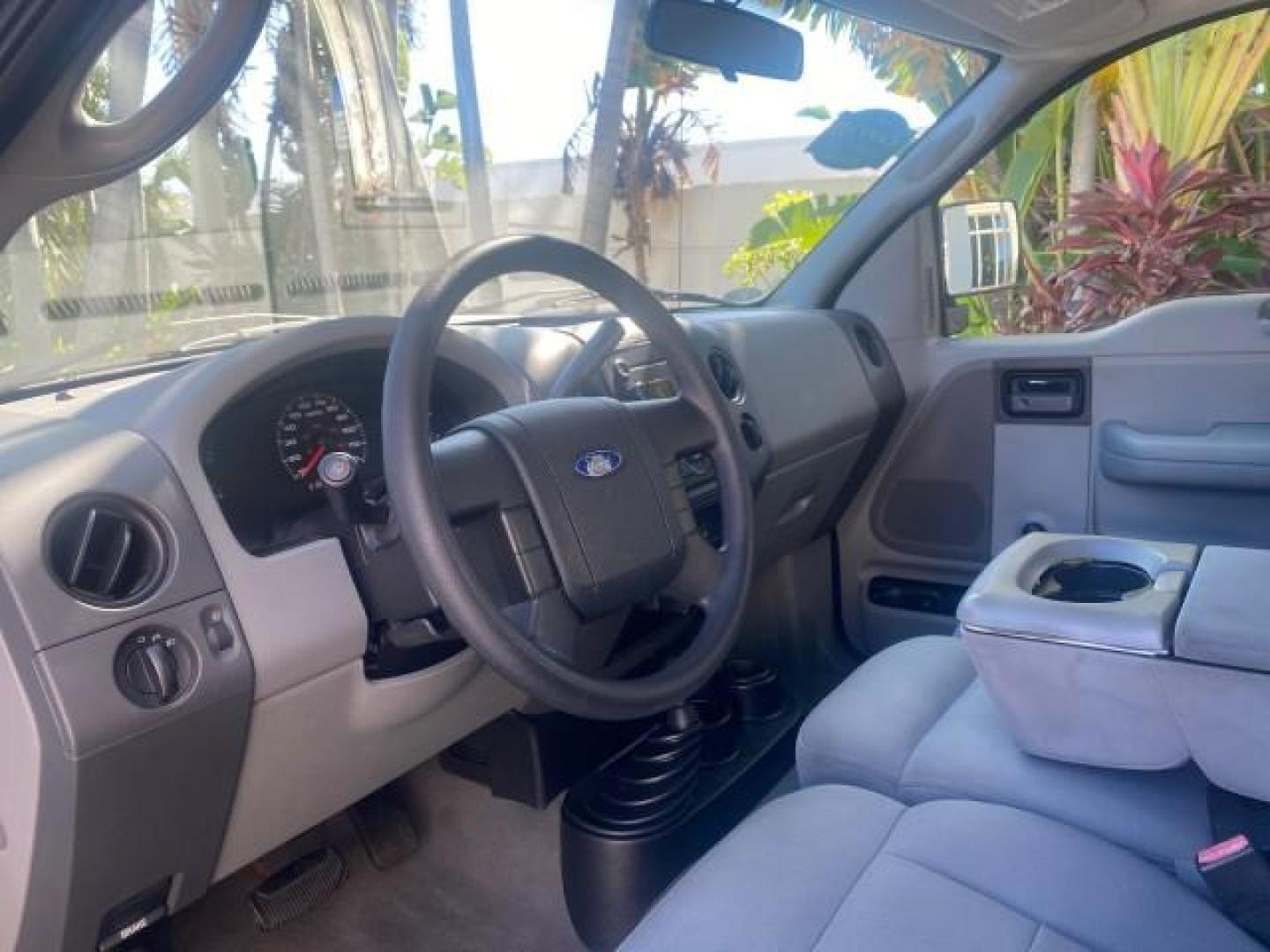 2004 Black /Flint Ford F-150 STX LOW MILES 46,755 4WD (1FTRF14W54N) with an 4.6L EFI V8 Engine engine, Automatic transmission, located at 4701 North Dixie Hwy, Pompano Beach, FL, 33064, (954) 422-2889, 26.240938, -80.123474 - OUR WEBPAGE FLORIDACARS1.COM HAS OVER 100 PHOTOS AND FREE CARFAX LINK 2004 FORD F-150 STX 4WD WE HAVE THE LOWEST MILEAGE ONE FOR SALE IN THE COUNTRY 46,755 VIN: 1FTRF14W54NB29502 1 F T R F 1 4 W 5 4 N B 2 9 5 0 2 PICKUP 4.6L V8 F SOHC 16V GASOLINE 18 MPG REAR WHEEL DRIVE W/ 4X4 Features 4WD/AWD ABS - Photo#47