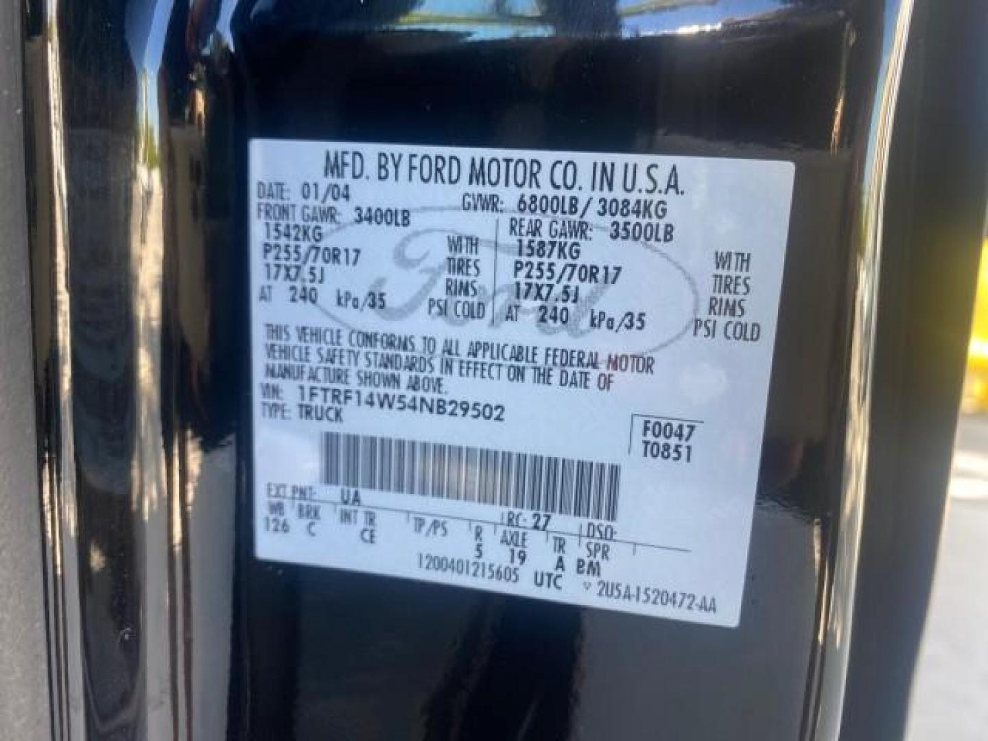 2004 Black /Flint Ford F-150 STX LOW MILES 46,755 4WD (1FTRF14W54N) with an 4.6L EFI V8 Engine engine, Automatic transmission, located at 4701 North Dixie Hwy, Pompano Beach, FL, 33064, (954) 422-2889, 26.240938, -80.123474 - OUR WEBPAGE FLORIDACARS1.COM HAS OVER 100 PHOTOS AND FREE CARFAX LINK 2004 FORD F-150 STX 4WD WE HAVE THE LOWEST MILEAGE ONE FOR SALE IN THE COUNTRY 46,755 VIN: 1FTRF14W54NB29502 1 F T R F 1 4 W 5 4 N B 2 9 5 0 2 PICKUP 4.6L V8 F SOHC 16V GASOLINE 18 MPG REAR WHEEL DRIVE W/ 4X4 Features 4WD/AWD ABS - Photo#69