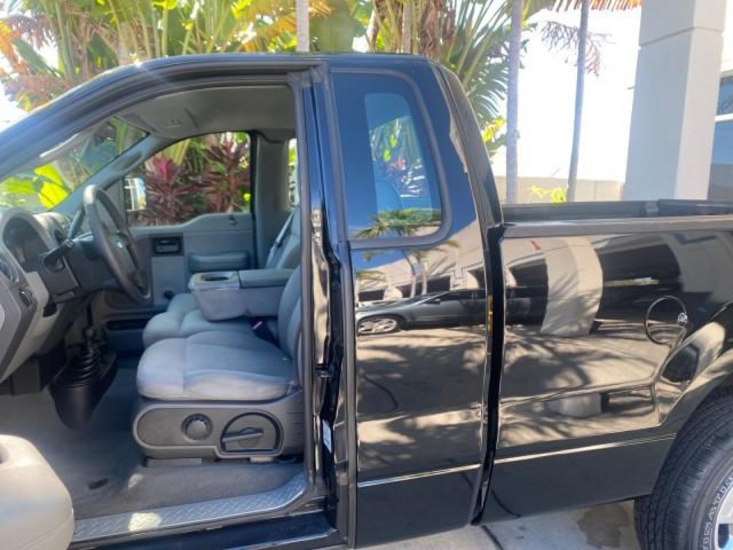 2004 Black /Flint Ford F-150 STX LOW MILES 46,755 4WD (1FTRF14W54N) with an 4.6L EFI V8 Engine engine, Automatic transmission, located at 4701 North Dixie Hwy, Pompano Beach, FL, 33064, (954) 422-2889, 26.240938, -80.123474 - OUR WEBPAGE FLORIDACARS1.COM HAS OVER 100 PHOTOS AND FREE CARFAX LINK 2004 FORD F-150 STX 4WD WE HAVE THE LOWEST MILEAGE ONE FOR SALE IN THE COUNTRY 46,755 VIN: 1FTRF14W54NB29502 1 F T R F 1 4 W 5 4 N B 2 9 5 0 2 PICKUP 4.6L V8 F SOHC 16V GASOLINE 18 MPG REAR WHEEL DRIVE W/ 4X4 Features 4WD/AWD ABS - Photo#70