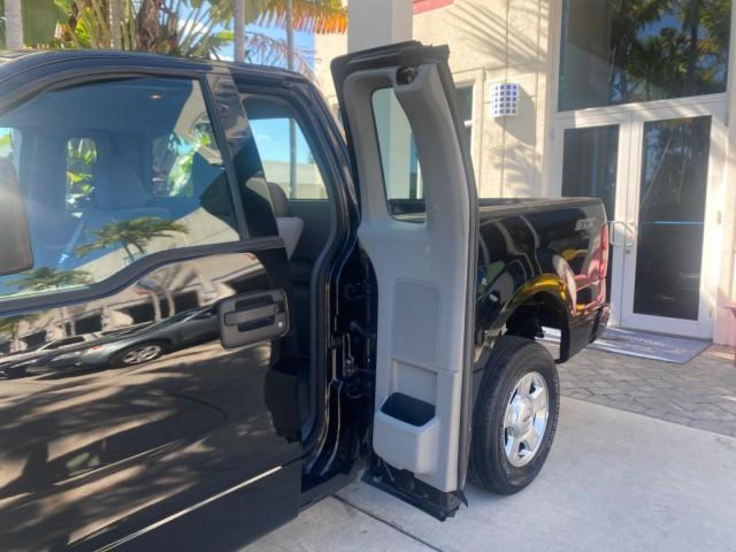 2004 Black /Flint Ford F-150 STX LOW MILES 46,755 4WD (1FTRF14W54N) with an 4.6L EFI V8 Engine engine, Automatic transmission, located at 4701 North Dixie Hwy, Pompano Beach, FL, 33064, (954) 422-2889, 26.240938, -80.123474 - OUR WEBPAGE FLORIDACARS1.COM HAS OVER 100 PHOTOS AND FREE CARFAX LINK 2004 FORD F-150 STX 4WD WE HAVE THE LOWEST MILEAGE ONE FOR SALE IN THE COUNTRY 46,755 VIN: 1FTRF14W54NB29502 1 F T R F 1 4 W 5 4 N B 2 9 5 0 2 PICKUP 4.6L V8 F SOHC 16V GASOLINE 18 MPG REAR WHEEL DRIVE W/ 4X4 Features 4WD/AWD ABS - Photo#71