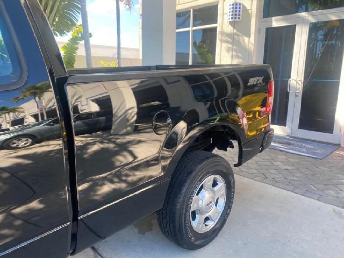 2004 Black /Flint Ford F-150 STX LOW MILES 46,755 4WD (1FTRF14W54N) with an 4.6L EFI V8 Engine engine, Automatic transmission, located at 4701 North Dixie Hwy, Pompano Beach, FL, 33064, (954) 422-2889, 26.240938, -80.123474 - OUR WEBPAGE FLORIDACARS1.COM HAS OVER 100 PHOTOS AND FREE CARFAX LINK 2004 FORD F-150 STX 4WD WE HAVE THE LOWEST MILEAGE ONE FOR SALE IN THE COUNTRY 46,755 VIN: 1FTRF14W54NB29502 1 F T R F 1 4 W 5 4 N B 2 9 5 0 2 PICKUP 4.6L V8 F SOHC 16V GASOLINE 18 MPG REAR WHEEL DRIVE W/ 4X4 Features 4WD/AWD ABS - Photo#77