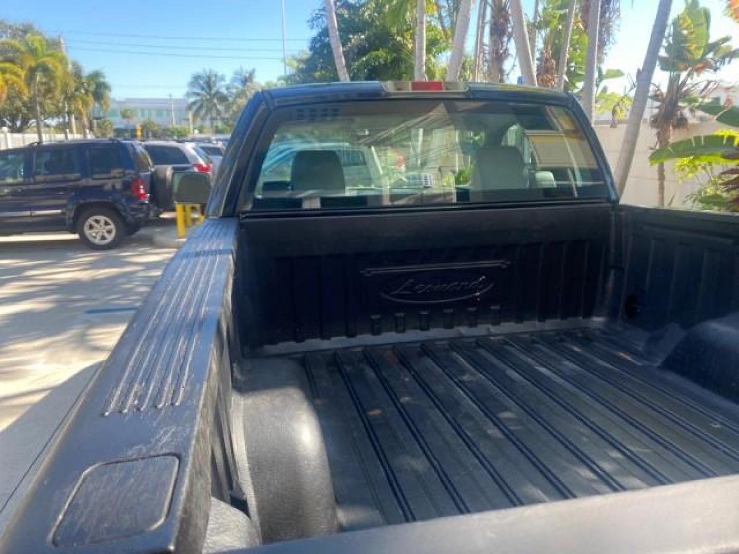 2004 Black /Flint Ford F-150 STX LOW MILES 46,755 4WD (1FTRF14W54N) with an 4.6L EFI V8 Engine engine, Automatic transmission, located at 4701 North Dixie Hwy, Pompano Beach, FL, 33064, (954) 422-2889, 26.240938, -80.123474 - OUR WEBPAGE FLORIDACARS1.COM HAS OVER 100 PHOTOS AND FREE CARFAX LINK 2004 FORD F-150 STX 4WD WE HAVE THE LOWEST MILEAGE ONE FOR SALE IN THE COUNTRY 46,755 VIN: 1FTRF14W54NB29502 1 F T R F 1 4 W 5 4 N B 2 9 5 0 2 PICKUP 4.6L V8 F SOHC 16V GASOLINE 18 MPG REAR WHEEL DRIVE W/ 4X4 Features 4WD/AWD ABS - Photo#90