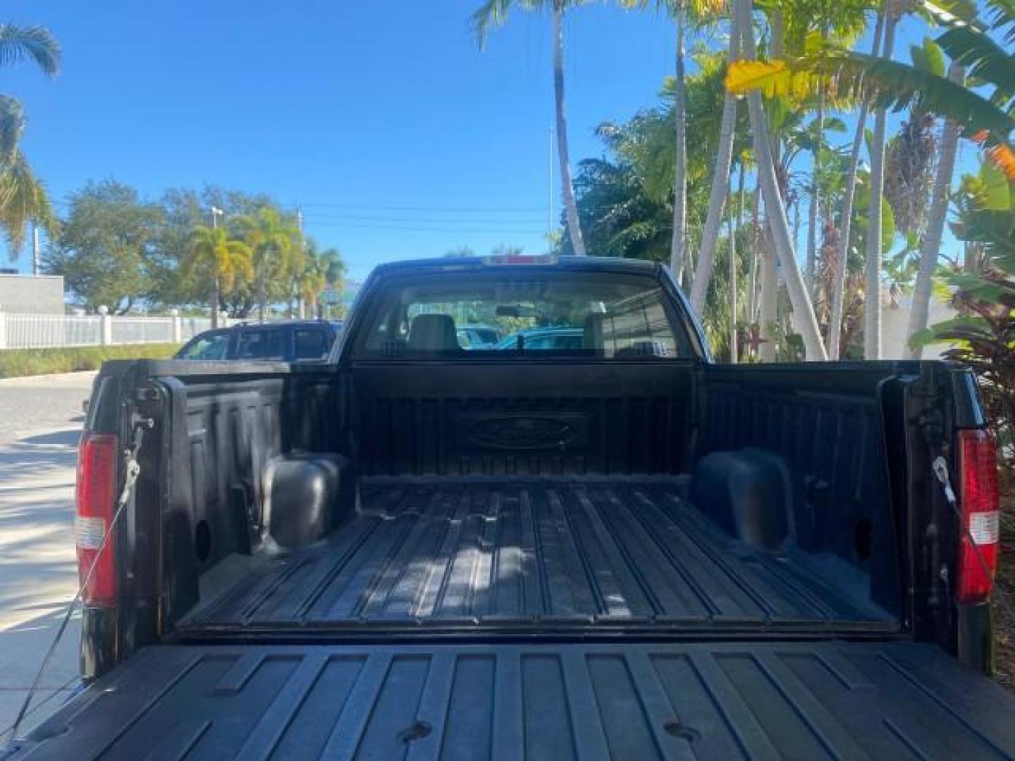 2004 Black /Flint Ford F-150 STX LOW MILES 46,755 4WD (1FTRF14W54N) with an 4.6L EFI V8 Engine engine, Automatic transmission, located at 4701 North Dixie Hwy, Pompano Beach, FL, 33064, (954) 422-2889, 26.240938, -80.123474 - OUR WEBPAGE FLORIDACARS1.COM HAS OVER 100 PHOTOS AND FREE CARFAX LINK 2004 FORD F-150 STX 4WD WE HAVE THE LOWEST MILEAGE ONE FOR SALE IN THE COUNTRY 46,755 VIN: 1FTRF14W54NB29502 1 F T R F 1 4 W 5 4 N B 2 9 5 0 2 PICKUP 4.6L V8 F SOHC 16V GASOLINE 18 MPG REAR WHEEL DRIVE W/ 4X4 Features 4WD/AWD ABS - Photo#95