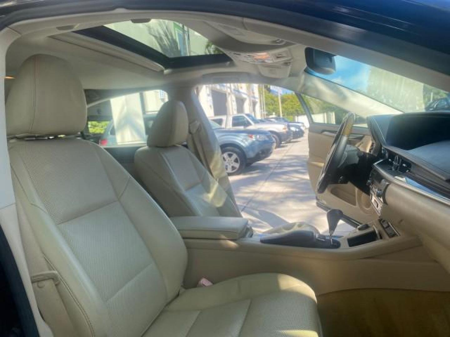 2013 Obsidian /Parchment Lexus ES 350 4dr Sdn LOW MILES 17,959 1 OWNER (JTHBK1GGXD2) with an 3.5L DOHC SFI 24-Valve V6 Engine engine, Automatic transmission, located at 4701 North Dixie Hwy, Pompano Beach, FL, 33064, (954) 422-2889, 26.240938, -80.123474 - OUR WEBPAGE FLORIDACARS1.COM HAS OVER 100 PHOTOS AND FREE CARFAX LINK 2013 LEXUS ES 350 - THIS IS THE LOWEST MILEAGE ONE IN THE COUNTRY FOR SALE 17,959 VIN: JTHBK1GGXD2003380 J T H B K 1 G G X D 2 0 0 3 3 8 0 SEDAN 4 DR 3.5L V6 F DOHC 24V GASOLINE 31 MPG FRONT WHEEL DRIVE Features A/C Seat(s) ABS Br - Photo#12