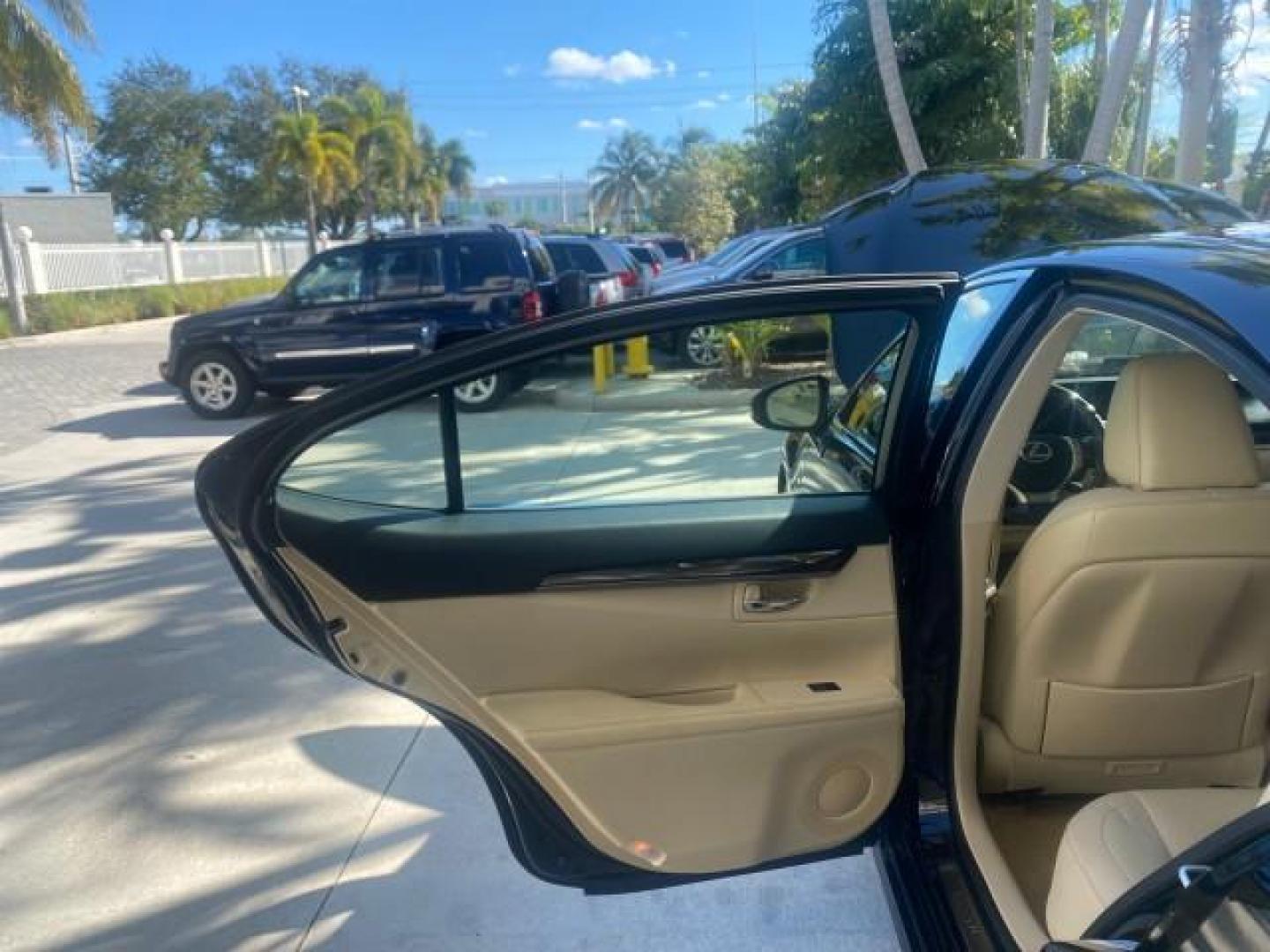 2013 Obsidian /Parchment Lexus ES 350 4dr Sdn LOW MILES 17,959 1 OWNER (JTHBK1GGXD2) with an 3.5L DOHC SFI 24-Valve V6 Engine engine, Automatic transmission, located at 4701 North Dixie Hwy, Pompano Beach, FL, 33064, (954) 422-2889, 26.240938, -80.123474 - OUR WEBPAGE FLORIDACARS1.COM HAS OVER 100 PHOTOS AND FREE CARFAX LINK 2013 LEXUS ES 350 - THIS IS THE LOWEST MILEAGE ONE IN THE COUNTRY FOR SALE 17,959 VIN: JTHBK1GGXD2003380 J T H B K 1 G G X D 2 0 0 3 3 8 0 SEDAN 4 DR 3.5L V6 F DOHC 24V GASOLINE 31 MPG FRONT WHEEL DRIVE Features A/C Seat(s) ABS Br - Photo#13