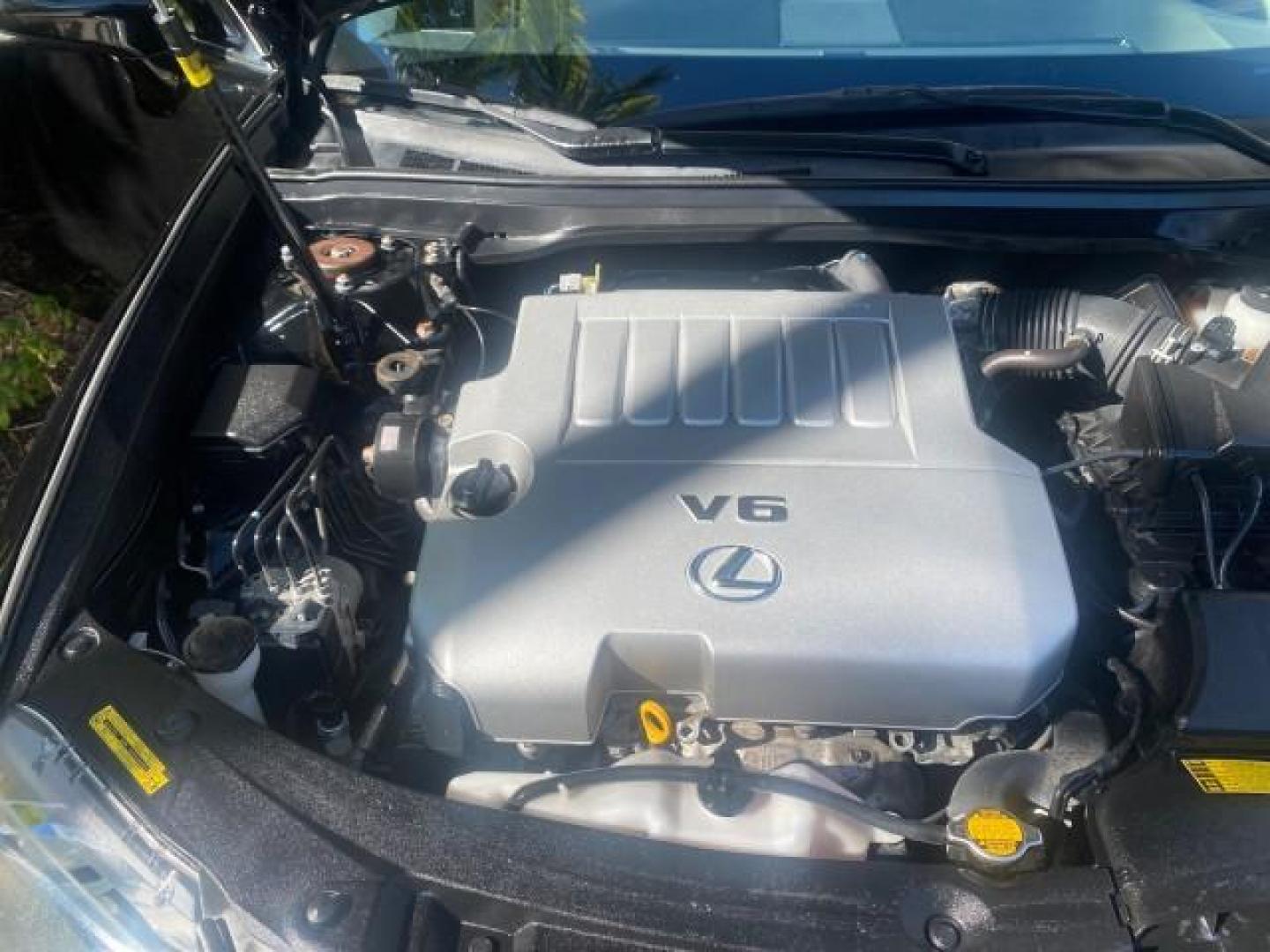 2013 Obsidian /Parchment Lexus ES 350 4dr Sdn LOW MILES 17,959 1 OWNER (JTHBK1GGXD2) with an 3.5L DOHC SFI 24-Valve V6 Engine engine, Automatic transmission, located at 4701 North Dixie Hwy, Pompano Beach, FL, 33064, (954) 422-2889, 26.240938, -80.123474 - OUR WEBPAGE FLORIDACARS1.COM HAS OVER 100 PHOTOS AND FREE CARFAX LINK 2013 LEXUS ES 350 - THIS IS THE LOWEST MILEAGE ONE IN THE COUNTRY FOR SALE 17,959 VIN: JTHBK1GGXD2003380 J T H B K 1 G G X D 2 0 0 3 3 8 0 SEDAN 4 DR 3.5L V6 F DOHC 24V GASOLINE 31 MPG FRONT WHEEL DRIVE Features A/C Seat(s) ABS Br - Photo#23