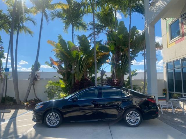 2013 Obsidian /Parchment Lexus ES 350 4dr Sdn LOW MILES 17,959 1 OWNER (JTHBK1GGXD2) with an 3.5L DOHC SFI 24-Valve V6 Engine engine, Automatic transmission, located at 4701 North Dixie Hwy, Pompano Beach, FL, 33064, (954) 422-2889, 26.240938, -80.123474 - OUR WEBPAGE FLORIDACARS1.COM HAS OVER 100 PHOTOS AND FREE CARFAX LINK 2013 LEXUS ES 350 - THIS IS THE LOWEST MILEAGE ONE IN THE COUNTRY FOR SALE 17,959 VIN: JTHBK1GGXD2003380 J T H B K 1 G G X D 2 0 0 3 3 8 0 SEDAN 4 DR 3.5L V6 F DOHC 24V GASOLINE 31 MPG FRONT WHEEL DRIVE Features A/C Seat(s) ABS Br - Photo#29