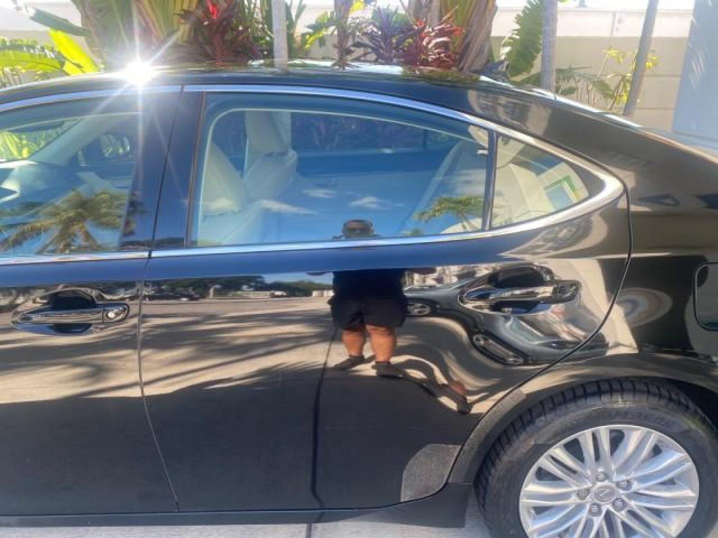 2013 Obsidian /Parchment Lexus ES 350 4dr Sdn LOW MILES 17,959 1 OWNER (JTHBK1GGXD2) with an 3.5L DOHC SFI 24-Valve V6 Engine engine, Automatic transmission, located at 4701 North Dixie Hwy, Pompano Beach, FL, 33064, (954) 422-2889, 26.240938, -80.123474 - OUR WEBPAGE FLORIDACARS1.COM HAS OVER 100 PHOTOS AND FREE CARFAX LINK 2013 LEXUS ES 350 - THIS IS THE LOWEST MILEAGE ONE IN THE COUNTRY FOR SALE 17,959 VIN: JTHBK1GGXD2003380 J T H B K 1 G G X D 2 0 0 3 3 8 0 SEDAN 4 DR 3.5L V6 F DOHC 24V GASOLINE 31 MPG FRONT WHEEL DRIVE Features A/C Seat(s) ABS Br - Photo#78