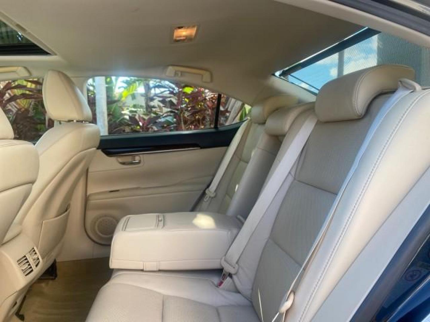 2013 Obsidian /Parchment Lexus ES 350 4dr Sdn LOW MILES 17,959 1 OWNER (JTHBK1GGXD2) with an 3.5L DOHC SFI 24-Valve V6 Engine engine, Automatic transmission, located at 4701 North Dixie Hwy, Pompano Beach, FL, 33064, (954) 422-2889, 26.240938, -80.123474 - OUR WEBPAGE FLORIDACARS1.COM HAS OVER 100 PHOTOS AND FREE CARFAX LINK 2013 LEXUS ES 350 - THIS IS THE LOWEST MILEAGE ONE IN THE COUNTRY FOR SALE 17,959 VIN: JTHBK1GGXD2003380 J T H B K 1 G G X D 2 0 0 3 3 8 0 SEDAN 4 DR 3.5L V6 F DOHC 24V GASOLINE 31 MPG FRONT WHEEL DRIVE Features A/C Seat(s) ABS Br - Photo#81