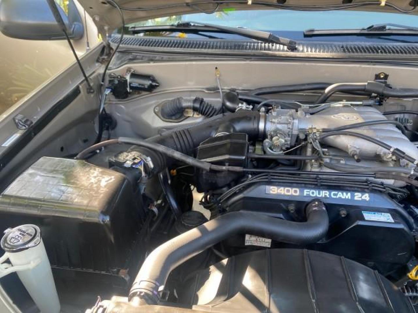 2001 Desert Sand Metallic /Oak Toyota Tundra LOW MILES 65,445 1 OWNER (5TBJN32151S) with an 3.4L DOHC EFI 24-Valve V6 Engine engine, Automatic transmission, located at 4701 North Dixie Hwy, Pompano Beach, FL, 33064, (954) 422-2889, 26.240938, -80.123474 - OUR WEBPAGE FLORIDACARS1.COM HAS OVER 100 PHOTOS AND FREE CARFAX LINK 2001 TOYOTA TUNDRA VIN: 5TBJN32151S215443 5 T B J N 3 2 1 5 1 S 2 1 5 4 4 3 PICKUP 3.4L V6 F DOHC 24V GASOLINE 20 MPG REAR WHEEL DRIVE Features Air Conditioning AM/FM Stereo Automatic Transmission Bed Cover Cassette Player Cloth S - Photo#25