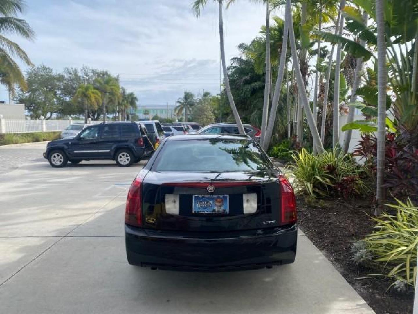 2004 Black Raven /Ebony Cadillac CTS LOW MILES 59,491 SUNROOF (1G6DM577140) with an 3.6L V6 VVT Engine engine, Automatic transmission, located at 4701 North Dixie Hwy, Pompano Beach, FL, 33064, (954) 422-2889, 26.240938, -80.123474 - OUR WEBPAGE FLORIDACARS1.COM HAS OVER 100 PHOTOS AND FREE CARFAX LINK 2004 CADILLAC CTS VIN: 1G6DM577140165313 1 G 6 D M 5 7 7 1 4 0 1 6 5 3 1 3 SEDAN 4 DR 3.6L V6 F GASOLINE 26 MPG REAR WHEEL DRIVE Features ABS Brakes Air Conditioning Alloy Wheels AM/FM Stereo Automatic Transmission CD Audio Cruise - Photo#6