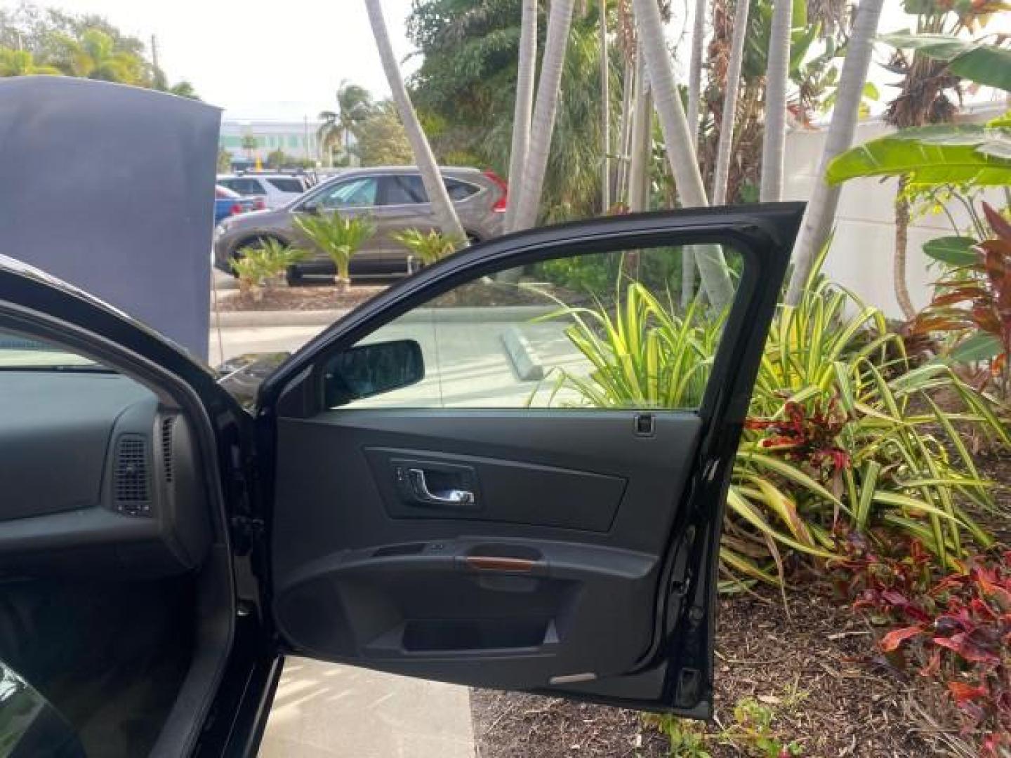 2004 Black Raven /Ebony Cadillac CTS LOW MILES 59,491 SUNROOF (1G6DM577140) with an 3.6L V6 VVT Engine engine, Automatic transmission, located at 4701 North Dixie Hwy, Pompano Beach, FL, 33064, (954) 422-2889, 26.240938, -80.123474 - OUR WEBPAGE FLORIDACARS1.COM HAS OVER 100 PHOTOS AND FREE CARFAX LINK 2004 CADILLAC CTS VIN: 1G6DM577140165313 1 G 6 D M 5 7 7 1 4 0 1 6 5 3 1 3 SEDAN 4 DR 3.6L V6 F GASOLINE 26 MPG REAR WHEEL DRIVE Features ABS Brakes Air Conditioning Alloy Wheels AM/FM Stereo Automatic Transmission CD Audio Cruise - Photo#11