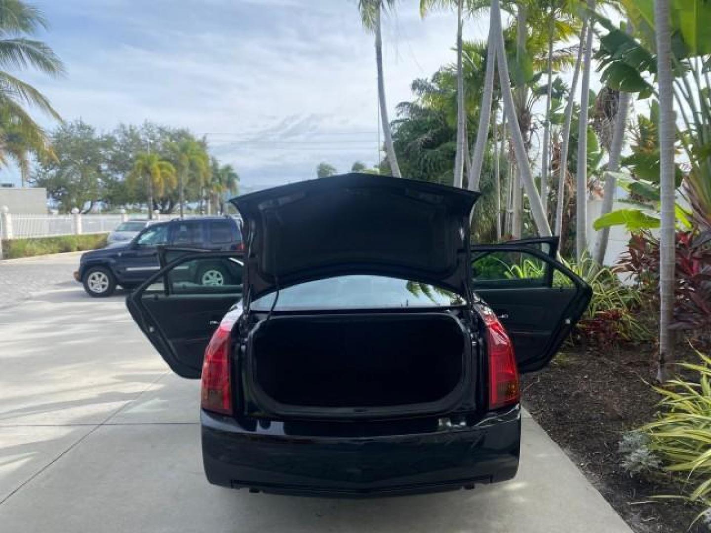 2004 Black Raven /Ebony Cadillac CTS LOW MILES 59,491 SUNROOF (1G6DM577140) with an 3.6L V6 VVT Engine engine, Automatic transmission, located at 4701 North Dixie Hwy, Pompano Beach, FL, 33064, (954) 422-2889, 26.240938, -80.123474 - OUR WEBPAGE FLORIDACARS1.COM HAS OVER 100 PHOTOS AND FREE CARFAX LINK 2004 CADILLAC CTS VIN: 1G6DM577140165313 1 G 6 D M 5 7 7 1 4 0 1 6 5 3 1 3 SEDAN 4 DR 3.6L V6 F GASOLINE 26 MPG REAR WHEEL DRIVE Features ABS Brakes Air Conditioning Alloy Wheels AM/FM Stereo Automatic Transmission CD Audio Cruise - Photo#15