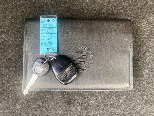 2004 Black Raven /Ebony Cadillac CTS LOW MILES 59,491 SUNROOF (1G6DM577140) with an 3.6L V6 VVT Engine engine, Automatic transmission, located at 4701 North Dixie Hwy, Pompano Beach, FL, 33064, (954) 422-2889, 26.240938, -80.123474 - OUR WEBPAGE FLORIDACARS1.COM HAS OVER 100 PHOTOS AND FREE CARFAX LINK 2004 CADILLAC CTS VIN: 1G6DM577140165313 1 G 6 D M 5 7 7 1 4 0 1 6 5 3 1 3 SEDAN 4 DR 3.6L V6 F GASOLINE 26 MPG REAR WHEEL DRIVE Features ABS Brakes Air Conditioning Alloy Wheels AM/FM Stereo Automatic Transmission CD Audio Cruise - Photo#23