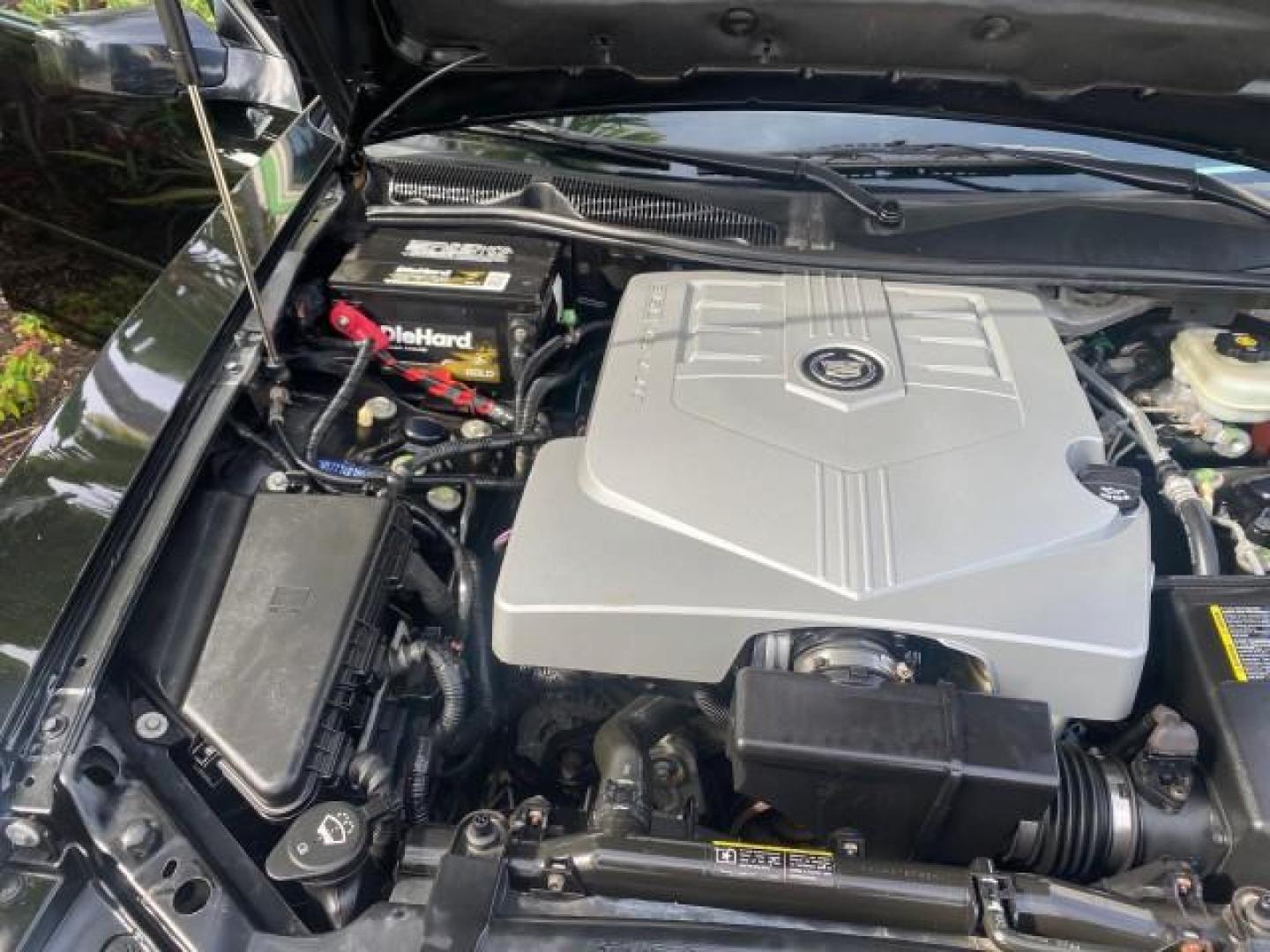 2004 Black Raven /Ebony Cadillac CTS LOW MILES 59,491 SUNROOF (1G6DM577140) with an 3.6L V6 VVT Engine engine, Automatic transmission, located at 4701 North Dixie Hwy, Pompano Beach, FL, 33064, (954) 422-2889, 26.240938, -80.123474 - OUR WEBPAGE FLORIDACARS1.COM HAS OVER 100 PHOTOS AND FREE CARFAX LINK 2004 CADILLAC CTS VIN: 1G6DM577140165313 1 G 6 D M 5 7 7 1 4 0 1 6 5 3 1 3 SEDAN 4 DR 3.6L V6 F GASOLINE 26 MPG REAR WHEEL DRIVE Features ABS Brakes Air Conditioning Alloy Wheels AM/FM Stereo Automatic Transmission CD Audio Cruise - Photo#25