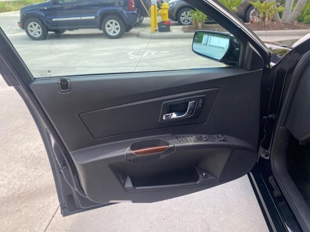 2004 Black Raven /Ebony Cadillac CTS LOW MILES 59,491 SUNROOF (1G6DM577140) with an 3.6L V6 VVT Engine engine, Automatic transmission, located at 4701 North Dixie Hwy, Pompano Beach, FL, 33064, (954) 422-2889, 26.240938, -80.123474 - OUR WEBPAGE FLORIDACARS1.COM HAS OVER 100 PHOTOS AND FREE CARFAX LINK 2004 CADILLAC CTS VIN: 1G6DM577140165313 1 G 6 D M 5 7 7 1 4 0 1 6 5 3 1 3 SEDAN 4 DR 3.6L V6 F GASOLINE 26 MPG REAR WHEEL DRIVE Features ABS Brakes Air Conditioning Alloy Wheels AM/FM Stereo Automatic Transmission CD Audio Cruise - Photo#43