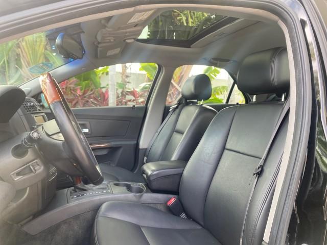 2004 Black Raven /Ebony Cadillac CTS LOW MILES 59,491 SUNROOF (1G6DM577140) with an 3.6L V6 VVT Engine engine, Automatic transmission, located at 4701 North Dixie Hwy, Pompano Beach, FL, 33064, (954) 422-2889, 26.240938, -80.123474 - OUR WEBPAGE FLORIDACARS1.COM HAS OVER 100 PHOTOS AND FREE CARFAX LINK 2004 CADILLAC CTS VIN: 1G6DM577140165313 1 G 6 D M 5 7 7 1 4 0 1 6 5 3 1 3 SEDAN 4 DR 3.6L V6 F GASOLINE 26 MPG REAR WHEEL DRIVE Features ABS Brakes Air Conditioning Alloy Wheels AM/FM Stereo Automatic Transmission CD Audio Cruise - Photo#44