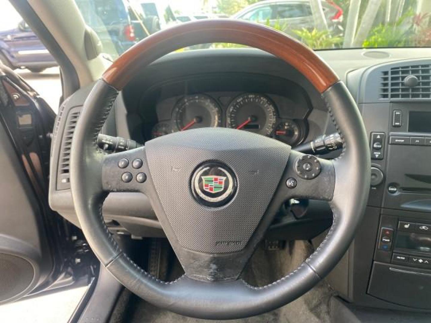 2004 Black Raven /Ebony Cadillac CTS LOW MILES 59,491 SUNROOF (1G6DM577140) with an 3.6L V6 VVT Engine engine, Automatic transmission, located at 4701 North Dixie Hwy, Pompano Beach, FL, 33064, (954) 422-2889, 26.240938, -80.123474 - OUR WEBPAGE FLORIDACARS1.COM HAS OVER 100 PHOTOS AND FREE CARFAX LINK 2004 CADILLAC CTS VIN: 1G6DM577140165313 1 G 6 D M 5 7 7 1 4 0 1 6 5 3 1 3 SEDAN 4 DR 3.6L V6 F GASOLINE 26 MPG REAR WHEEL DRIVE Features ABS Brakes Air Conditioning Alloy Wheels AM/FM Stereo Automatic Transmission CD Audio Cruise - Photo#49