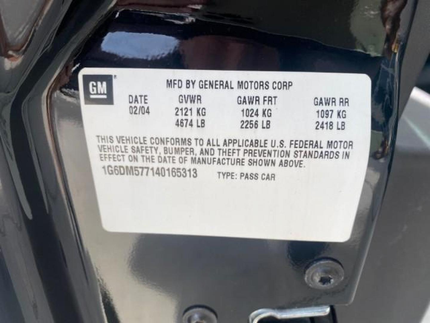 2004 Black Raven /Ebony Cadillac CTS LOW MILES 59,491 SUNROOF (1G6DM577140) with an 3.6L V6 VVT Engine engine, Automatic transmission, located at 4701 North Dixie Hwy, Pompano Beach, FL, 33064, (954) 422-2889, 26.240938, -80.123474 - OUR WEBPAGE FLORIDACARS1.COM HAS OVER 100 PHOTOS AND FREE CARFAX LINK 2004 CADILLAC CTS VIN: 1G6DM577140165313 1 G 6 D M 5 7 7 1 4 0 1 6 5 3 1 3 SEDAN 4 DR 3.6L V6 F GASOLINE 26 MPG REAR WHEEL DRIVE Features ABS Brakes Air Conditioning Alloy Wheels AM/FM Stereo Automatic Transmission CD Audio Cruise - Photo#75