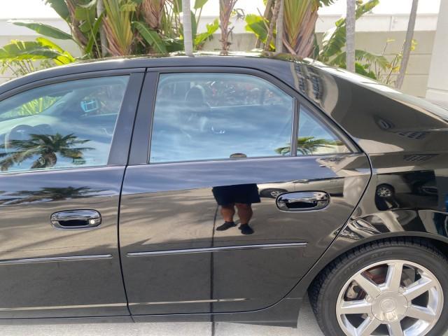 2004 Black Raven /Ebony Cadillac CTS LOW MILES 59,491 SUNROOF (1G6DM577140) with an 3.6L V6 VVT Engine engine, Automatic transmission, located at 4701 North Dixie Hwy, Pompano Beach, FL, 33064, (954) 422-2889, 26.240938, -80.123474 - OUR WEBPAGE FLORIDACARS1.COM HAS OVER 100 PHOTOS AND FREE CARFAX LINK 2004 CADILLAC CTS VIN: 1G6DM577140165313 1 G 6 D M 5 7 7 1 4 0 1 6 5 3 1 3 SEDAN 4 DR 3.6L V6 F GASOLINE 26 MPG REAR WHEEL DRIVE Features ABS Brakes Air Conditioning Alloy Wheels AM/FM Stereo Automatic Transmission CD Audio Cruise - Photo#76