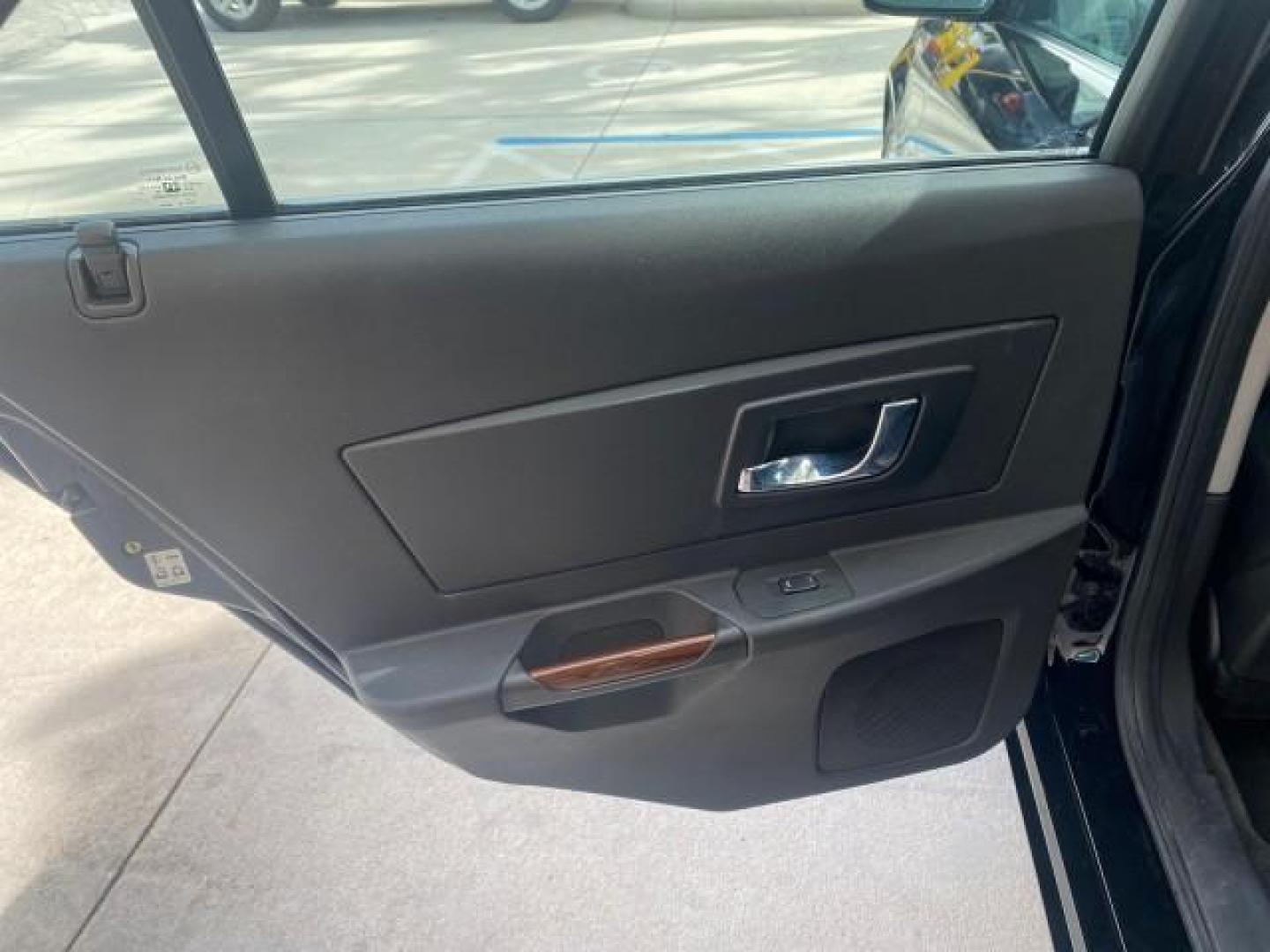 2004 Black Raven /Ebony Cadillac CTS LOW MILES 59,491 SUNROOF (1G6DM577140) with an 3.6L V6 VVT Engine engine, Automatic transmission, located at 4701 North Dixie Hwy, Pompano Beach, FL, 33064, (954) 422-2889, 26.240938, -80.123474 - OUR WEBPAGE FLORIDACARS1.COM HAS OVER 100 PHOTOS AND FREE CARFAX LINK 2004 CADILLAC CTS VIN: 1G6DM577140165313 1 G 6 D M 5 7 7 1 4 0 1 6 5 3 1 3 SEDAN 4 DR 3.6L V6 F GASOLINE 26 MPG REAR WHEEL DRIVE Features ABS Brakes Air Conditioning Alloy Wheels AM/FM Stereo Automatic Transmission CD Audio Cruise - Photo#78