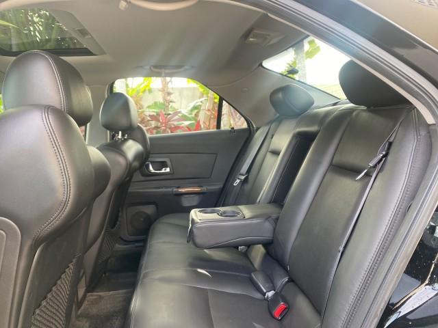 2004 Black Raven /Ebony Cadillac CTS LOW MILES 59,491 SUNROOF (1G6DM577140) with an 3.6L V6 VVT Engine engine, Automatic transmission, located at 4701 North Dixie Hwy, Pompano Beach, FL, 33064, (954) 422-2889, 26.240938, -80.123474 - OUR WEBPAGE FLORIDACARS1.COM HAS OVER 100 PHOTOS AND FREE CARFAX LINK 2004 CADILLAC CTS VIN: 1G6DM577140165313 1 G 6 D M 5 7 7 1 4 0 1 6 5 3 1 3 SEDAN 4 DR 3.6L V6 F GASOLINE 26 MPG REAR WHEEL DRIVE Features ABS Brakes Air Conditioning Alloy Wheels AM/FM Stereo Automatic Transmission CD Audio Cruise - Photo#79