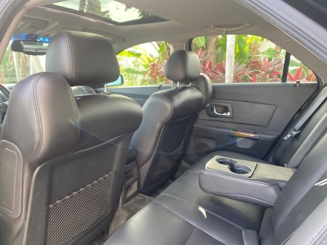 2004 Black Raven /Ebony Cadillac CTS LOW MILES 59,491 SUNROOF (1G6DM577140) with an 3.6L V6 VVT Engine engine, Automatic transmission, located at 4701 North Dixie Hwy, Pompano Beach, FL, 33064, (954) 422-2889, 26.240938, -80.123474 - OUR WEBPAGE FLORIDACARS1.COM HAS OVER 100 PHOTOS AND FREE CARFAX LINK 2004 CADILLAC CTS VIN: 1G6DM577140165313 1 G 6 D M 5 7 7 1 4 0 1 6 5 3 1 3 SEDAN 4 DR 3.6L V6 F GASOLINE 26 MPG REAR WHEEL DRIVE Features ABS Brakes Air Conditioning Alloy Wheels AM/FM Stereo Automatic Transmission CD Audio Cruise - Photo#82