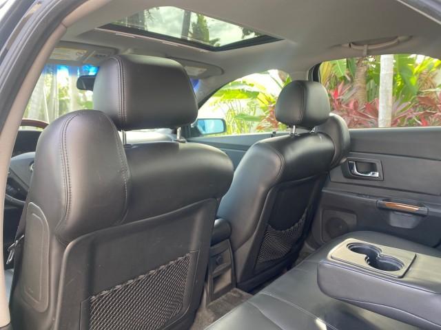 2004 Black Raven /Ebony Cadillac CTS LOW MILES 59,491 SUNROOF (1G6DM577140) with an 3.6L V6 VVT Engine engine, Automatic transmission, located at 4701 North Dixie Hwy, Pompano Beach, FL, 33064, (954) 422-2889, 26.240938, -80.123474 - OUR WEBPAGE FLORIDACARS1.COM HAS OVER 100 PHOTOS AND FREE CARFAX LINK 2004 CADILLAC CTS VIN: 1G6DM577140165313 1 G 6 D M 5 7 7 1 4 0 1 6 5 3 1 3 SEDAN 4 DR 3.6L V6 F GASOLINE 26 MPG REAR WHEEL DRIVE Features ABS Brakes Air Conditioning Alloy Wheels AM/FM Stereo Automatic Transmission CD Audio Cruise - Photo#84
