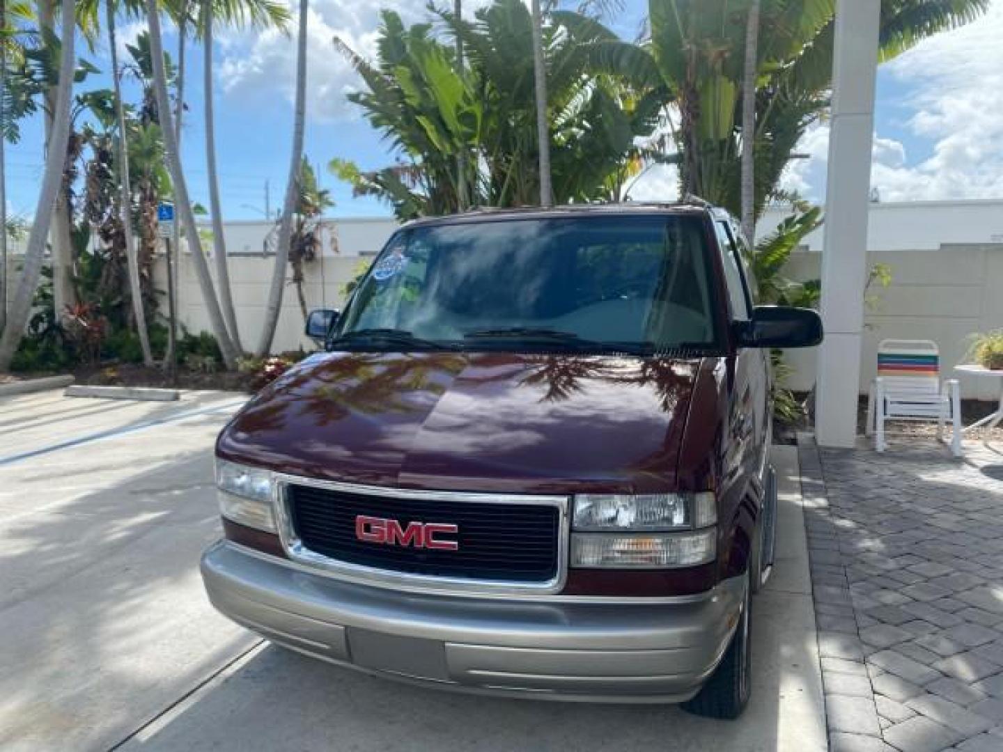 2003 Dark Toreador Red Metallic /Pewter GMC Safari Passenger LOW MILES 34,284 1 OWNER 8 PASSENGER (1GKEL19X13B) with an 4.3L Vortec 4300 V6 MFI Engine engine, Automatic transmission, located at 4701 North Dixie Hwy, Pompano Beach, FL, 33064, (954) 422-2889, 26.240938, -80.123474 - OUR WEBPAGE FLORIDACARS1.COM HAS OVER 100 PHOTOS AND FREE CARFAX LINK 2003 GMC SAFARI 8 PASSENGER AWD 1 OWNER SINCE NEW - ONE OF A KIND FIND VIN: 1GKEL19X13B516237 1 G K E L 1 9 X 1 3 B 5 1 6 2 3 7 VAN 4.3L V6 F OHV 12V GASOLINE 18 MPG ALL WHEEL DRIVE Features 4WD/AWD ABS Brakes Air Conditioning All - Photo#3