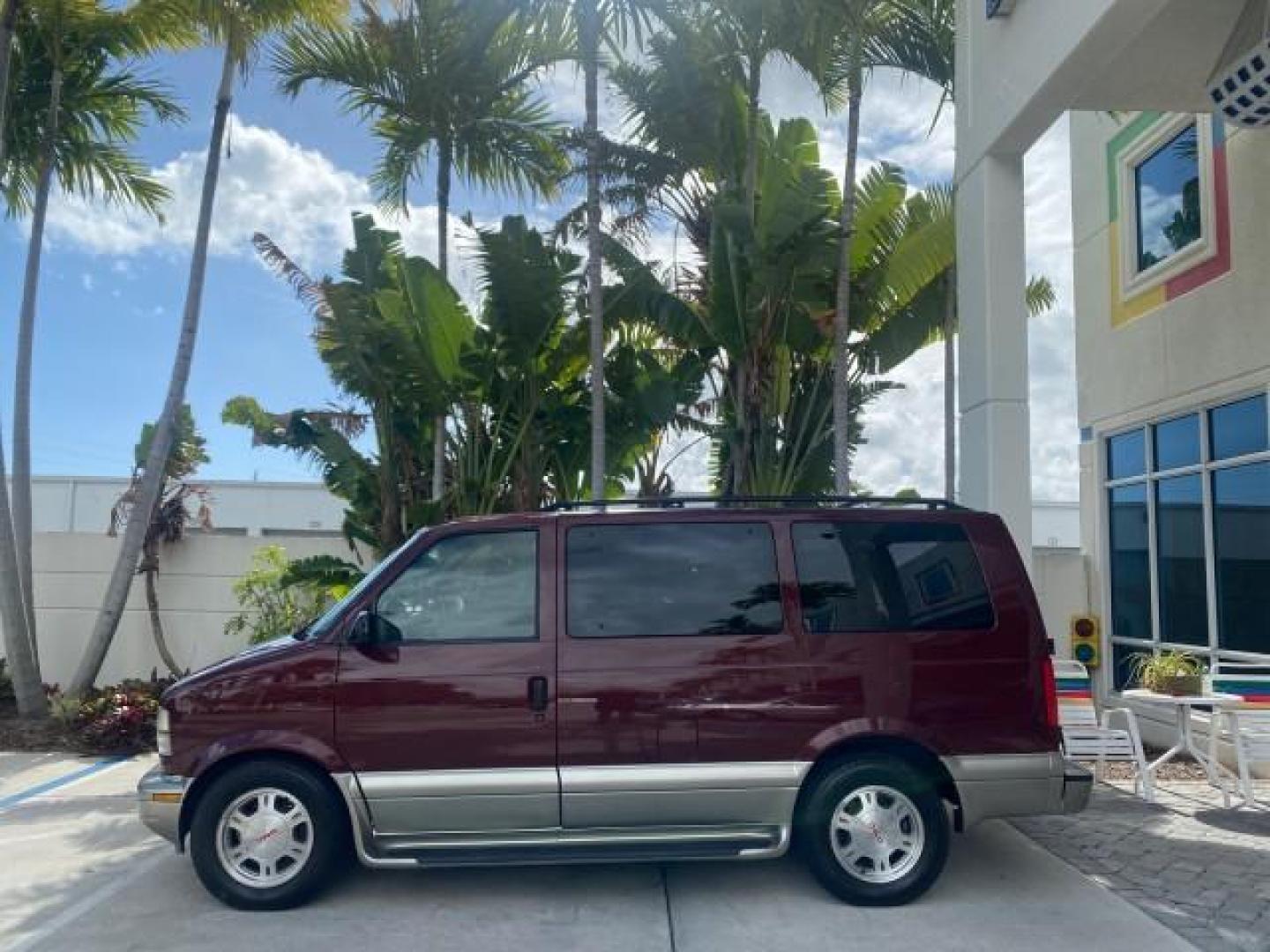2003 Dark Toreador Red Metallic /Pewter GMC Safari Passenger LOW MILES 34,284 1 OWNER 8 PASSENGER (1GKEL19X13B) with an 4.3L Vortec 4300 V6 MFI Engine engine, Automatic transmission, located at 4701 North Dixie Hwy, Pompano Beach, FL, 33064, (954) 422-2889, 26.240938, -80.123474 - OUR WEBPAGE FLORIDACARS1.COM HAS OVER 100 PHOTOS AND FREE CARFAX LINK 2003 GMC SAFARI 8 PASSENGER AWD 1 OWNER SINCE NEW - ONE OF A KIND FIND VIN: 1GKEL19X13B516237 1 G K E L 1 9 X 1 3 B 5 1 6 2 3 7 VAN 4.3L V6 F OHV 12V GASOLINE 18 MPG ALL WHEEL DRIVE Features 4WD/AWD ABS Brakes Air Conditioning All - Photo#4