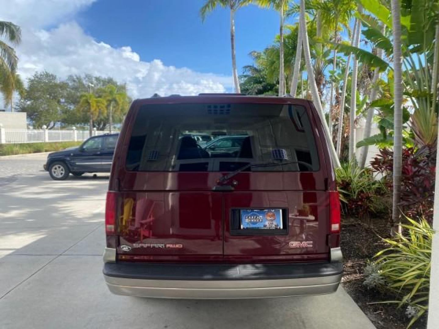 2003 Dark Toreador Red Metallic /Pewter GMC Safari Passenger LOW MILES 34,284 1 OWNER 8 PASSENGER (1GKEL19X13B) with an 4.3L Vortec 4300 V6 MFI Engine engine, Automatic transmission, located at 4701 North Dixie Hwy, Pompano Beach, FL, 33064, (954) 422-2889, 26.240938, -80.123474 - OUR WEBPAGE FLORIDACARS1.COM HAS OVER 100 PHOTOS AND FREE CARFAX LINK 2003 GMC SAFARI 8 PASSENGER AWD 1 OWNER SINCE NEW - ONE OF A KIND FIND VIN: 1GKEL19X13B516237 1 G K E L 1 9 X 1 3 B 5 1 6 2 3 7 VAN 4.3L V6 F OHV 12V GASOLINE 18 MPG ALL WHEEL DRIVE Features 4WD/AWD ABS Brakes Air Conditioning All - Photo#6