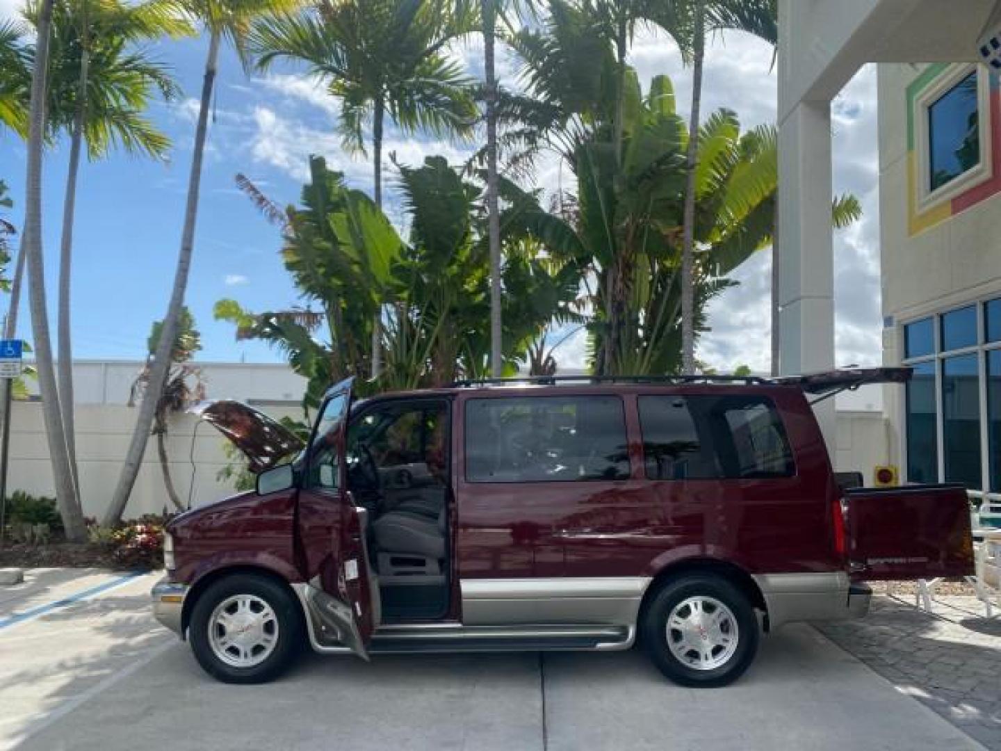 2003 Dark Toreador Red Metallic /Pewter GMC Safari Passenger LOW MILES 34,284 1 OWNER 8 PASSENGER (1GKEL19X13B) with an 4.3L Vortec 4300 V6 MFI Engine engine, Automatic transmission, located at 4701 North Dixie Hwy, Pompano Beach, FL, 33064, (954) 422-2889, 26.240938, -80.123474 - OUR WEBPAGE FLORIDACARS1.COM HAS OVER 100 PHOTOS AND FREE CARFAX LINK 2003 GMC SAFARI 8 PASSENGER AWD 1 OWNER SINCE NEW - ONE OF A KIND FIND VIN: 1GKEL19X13B516237 1 G K E L 1 9 X 1 3 B 5 1 6 2 3 7 VAN 4.3L V6 F OHV 12V GASOLINE 18 MPG ALL WHEEL DRIVE Features 4WD/AWD ABS Brakes Air Conditioning All - Photo#8