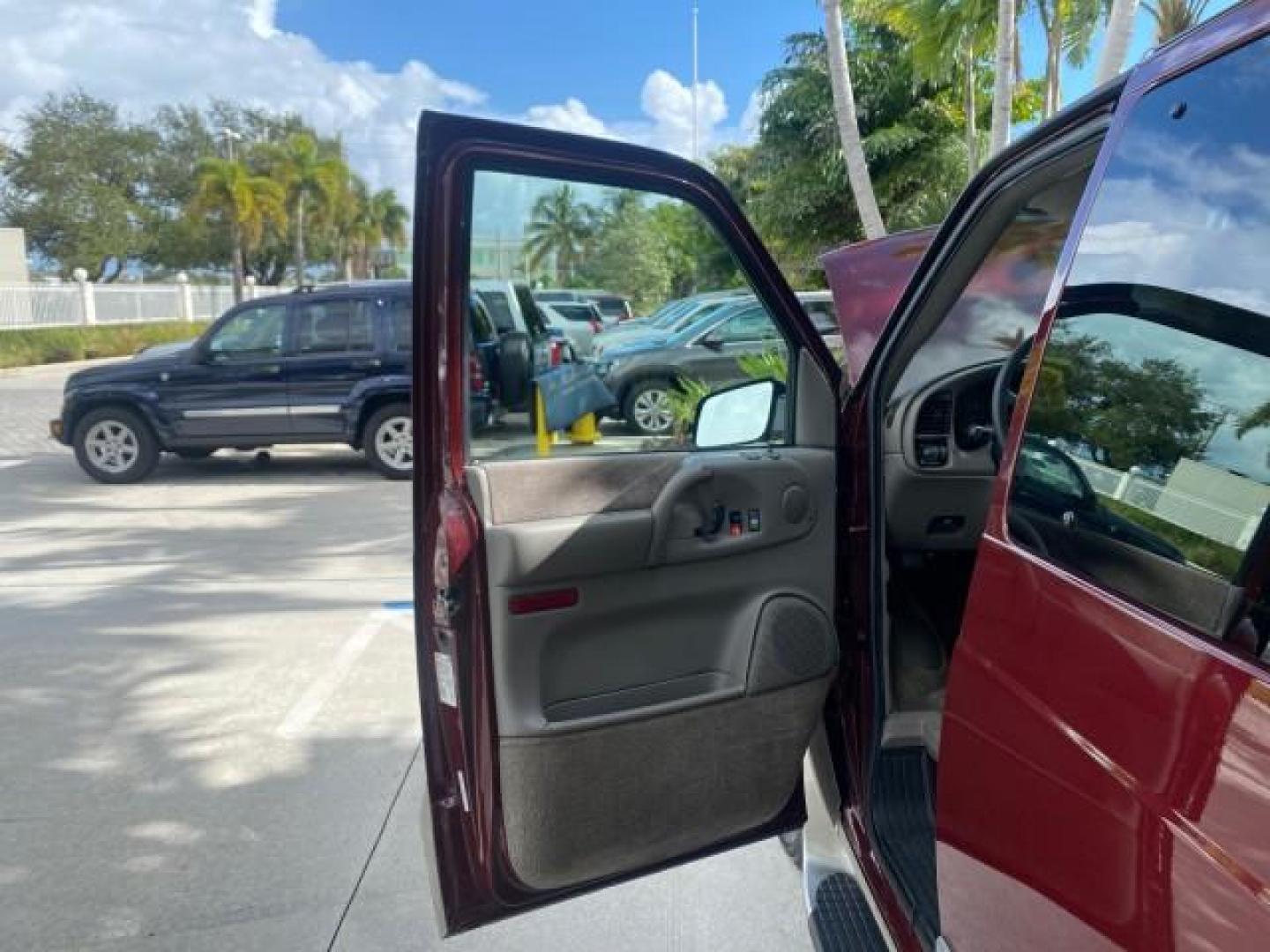 2003 Dark Toreador Red Metallic /Pewter GMC Safari Passenger LOW MILES 34,284 1 OWNER 8 PASSENGER (1GKEL19X13B) with an 4.3L Vortec 4300 V6 MFI Engine engine, Automatic transmission, located at 4701 North Dixie Hwy, Pompano Beach, FL, 33064, (954) 422-2889, 26.240938, -80.123474 - OUR WEBPAGE FLORIDACARS1.COM HAS OVER 100 PHOTOS AND FREE CARFAX LINK 2003 GMC SAFARI 8 PASSENGER AWD 1 OWNER SINCE NEW - ONE OF A KIND FIND VIN: 1GKEL19X13B516237 1 G K E L 1 9 X 1 3 B 5 1 6 2 3 7 VAN 4.3L V6 F OHV 12V GASOLINE 18 MPG ALL WHEEL DRIVE Features 4WD/AWD ABS Brakes Air Conditioning All - Photo#9