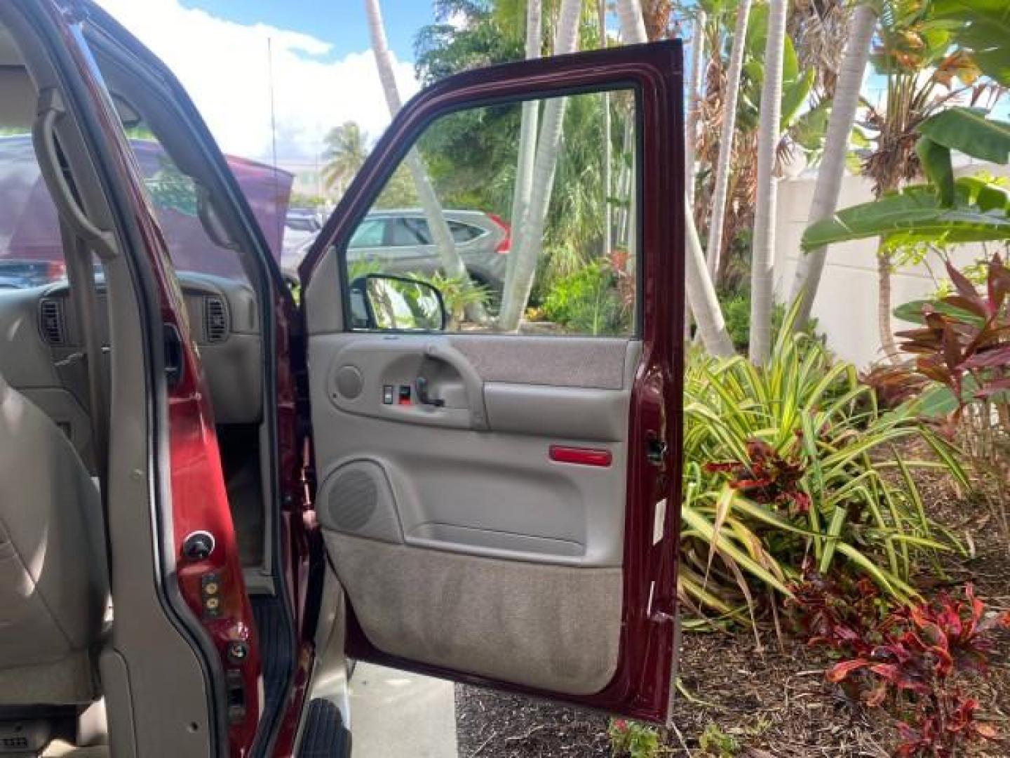 2003 Dark Toreador Red Metallic /Pewter GMC Safari Passenger LOW MILES 34,284 1 OWNER 8 PASSENGER (1GKEL19X13B) with an 4.3L Vortec 4300 V6 MFI Engine engine, Automatic transmission, located at 4701 North Dixie Hwy, Pompano Beach, FL, 33064, (954) 422-2889, 26.240938, -80.123474 - OUR WEBPAGE FLORIDACARS1.COM HAS OVER 100 PHOTOS AND FREE CARFAX LINK 2003 GMC SAFARI 8 PASSENGER AWD 1 OWNER SINCE NEW - ONE OF A KIND FIND VIN: 1GKEL19X13B516237 1 G K E L 1 9 X 1 3 B 5 1 6 2 3 7 VAN 4.3L V6 F OHV 12V GASOLINE 18 MPG ALL WHEEL DRIVE Features 4WD/AWD ABS Brakes Air Conditioning All - Photo#11