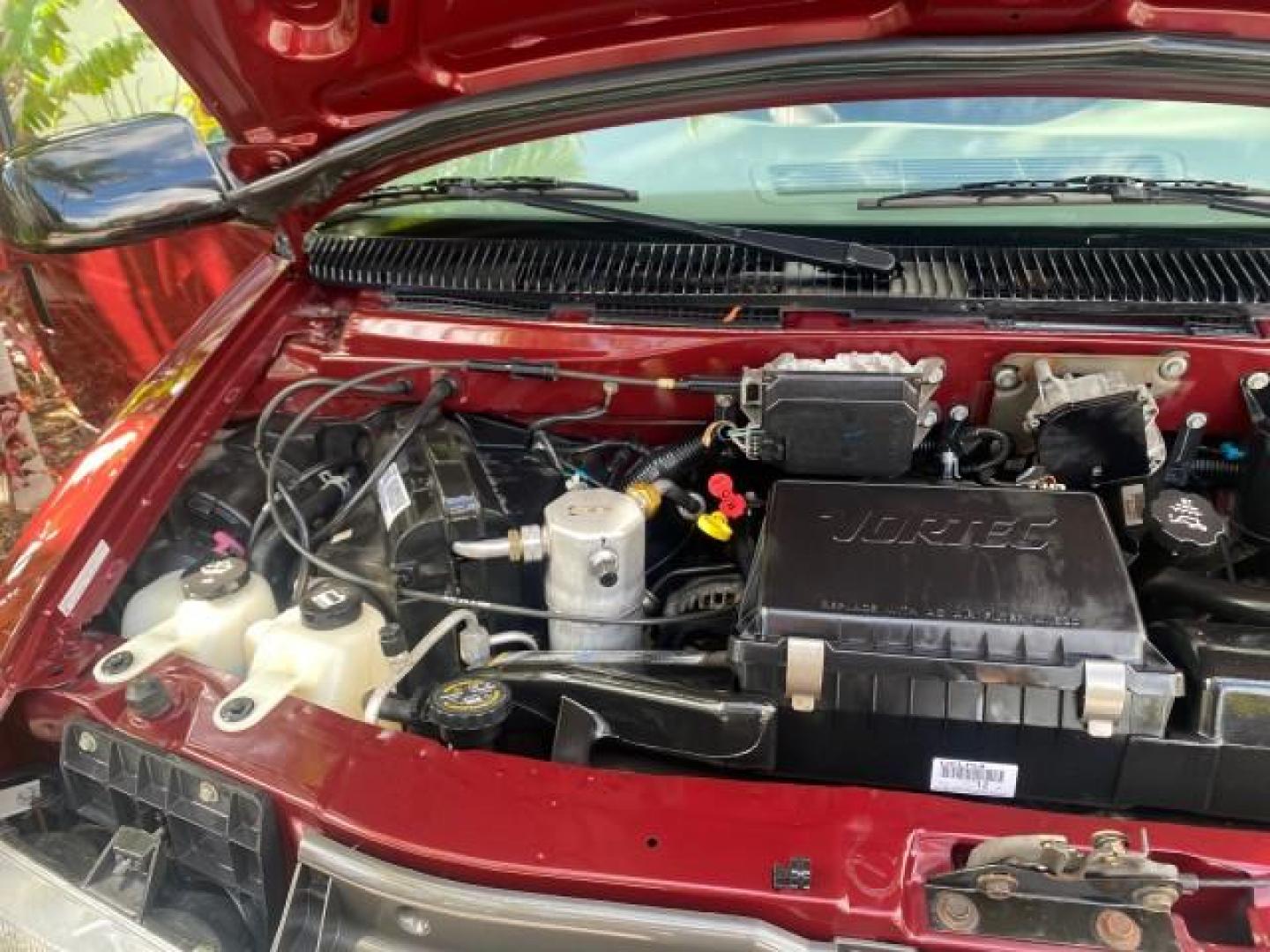 2003 Dark Toreador Red Metallic /Pewter GMC Safari Passenger LOW MILES 34,284 1 OWNER 8 PASSENGER (1GKEL19X13B) with an 4.3L Vortec 4300 V6 MFI Engine engine, Automatic transmission, located at 4701 North Dixie Hwy, Pompano Beach, FL, 33064, (954) 422-2889, 26.240938, -80.123474 - OUR WEBPAGE FLORIDACARS1.COM HAS OVER 100 PHOTOS AND FREE CARFAX LINK 2003 GMC SAFARI 8 PASSENGER AWD 1 OWNER SINCE NEW - ONE OF A KIND FIND VIN: 1GKEL19X13B516237 1 G K E L 1 9 X 1 3 B 5 1 6 2 3 7 VAN 4.3L V6 F OHV 12V GASOLINE 18 MPG ALL WHEEL DRIVE Features 4WD/AWD ABS Brakes Air Conditioning All - Photo#25