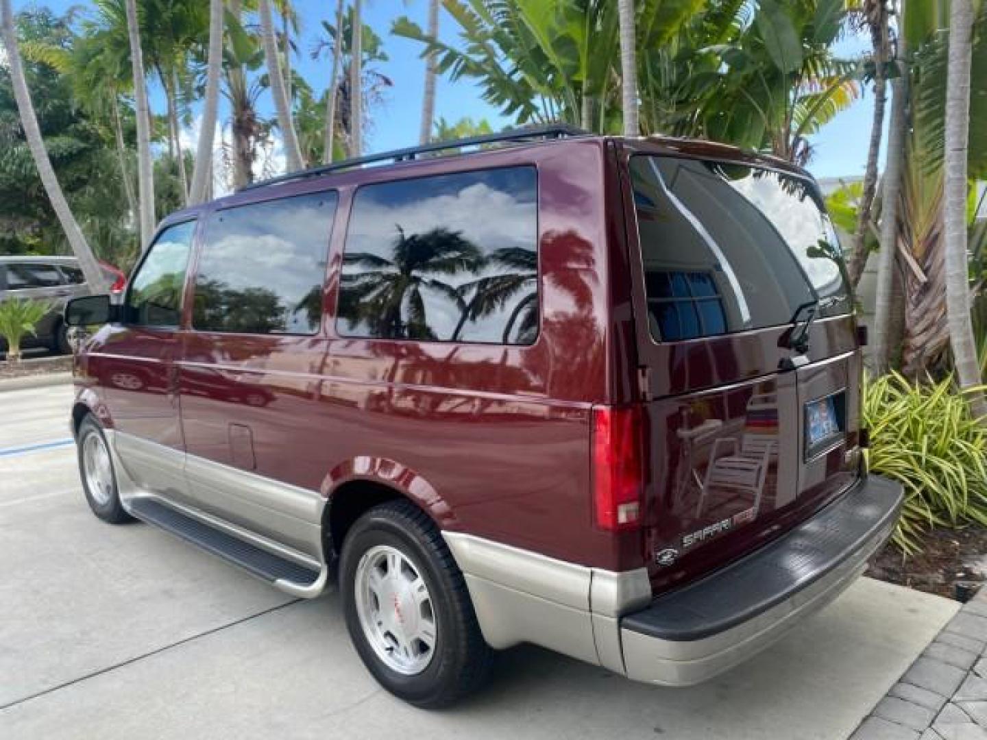 2003 Dark Toreador Red Metallic /Pewter GMC Safari Passenger LOW MILES 34,284 1 OWNER 8 PASSENGER (1GKEL19X13B) with an 4.3L Vortec 4300 V6 MFI Engine engine, Automatic transmission, located at 4701 North Dixie Hwy, Pompano Beach, FL, 33064, (954) 422-2889, 26.240938, -80.123474 - OUR WEBPAGE FLORIDACARS1.COM HAS OVER 100 PHOTOS AND FREE CARFAX LINK 2003 GMC SAFARI 8 PASSENGER AWD 1 OWNER SINCE NEW - ONE OF A KIND FIND VIN: 1GKEL19X13B516237 1 G K E L 1 9 X 1 3 B 5 1 6 2 3 7 VAN 4.3L V6 F OHV 12V GASOLINE 18 MPG ALL WHEEL DRIVE Features 4WD/AWD ABS Brakes Air Conditioning All - Photo#34