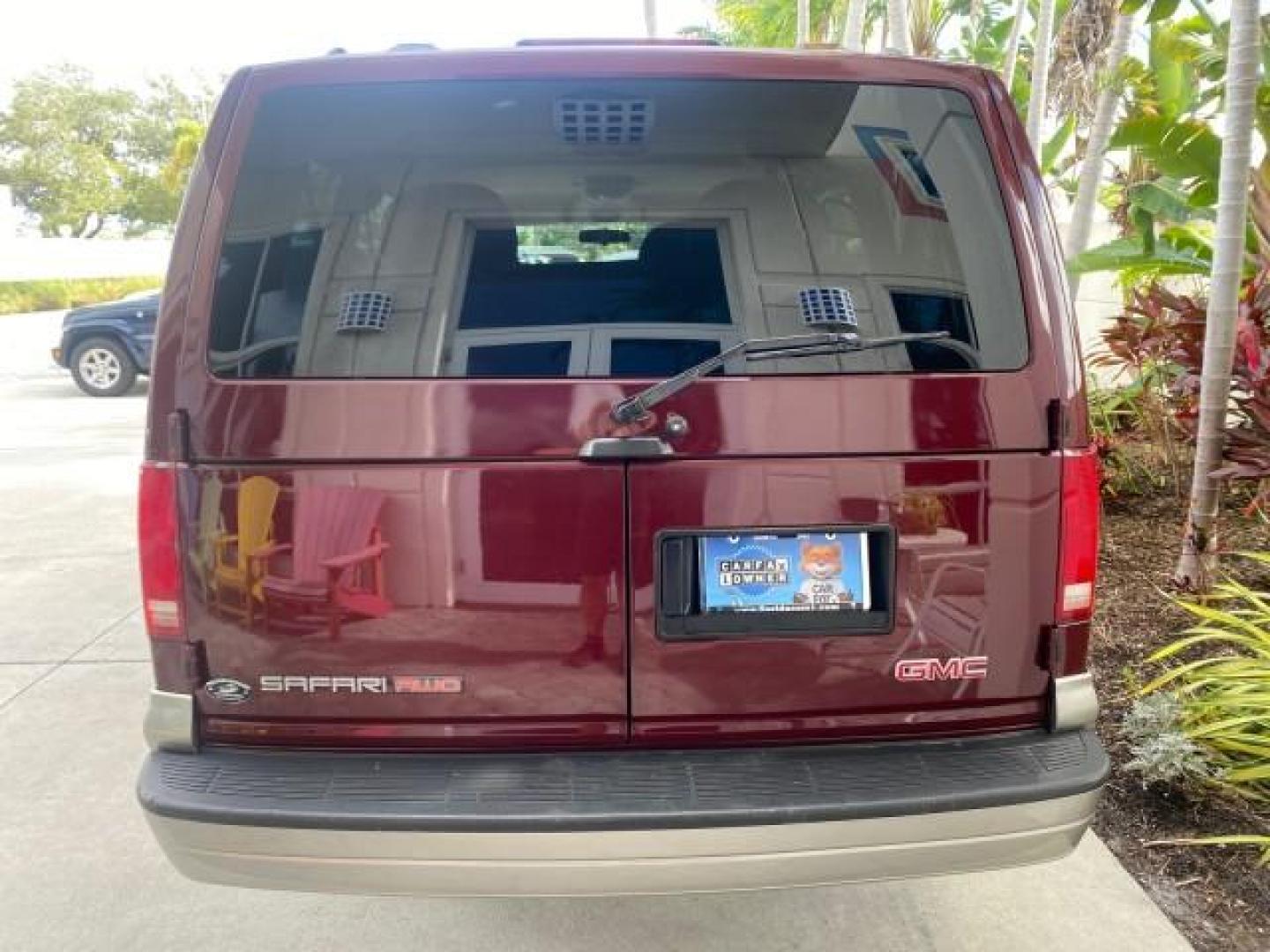 2003 Dark Toreador Red Metallic /Pewter GMC Safari Passenger LOW MILES 34,284 1 OWNER 8 PASSENGER (1GKEL19X13B) with an 4.3L Vortec 4300 V6 MFI Engine engine, Automatic transmission, located at 4701 North Dixie Hwy, Pompano Beach, FL, 33064, (954) 422-2889, 26.240938, -80.123474 - OUR WEBPAGE FLORIDACARS1.COM HAS OVER 100 PHOTOS AND FREE CARFAX LINK 2003 GMC SAFARI 8 PASSENGER AWD 1 OWNER SINCE NEW - ONE OF A KIND FIND VIN: 1GKEL19X13B516237 1 G K E L 1 9 X 1 3 B 5 1 6 2 3 7 VAN 4.3L V6 F OHV 12V GASOLINE 18 MPG ALL WHEEL DRIVE Features 4WD/AWD ABS Brakes Air Conditioning All - Photo#36