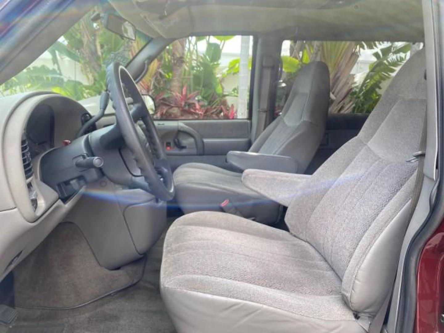 2003 Dark Toreador Red Metallic /Pewter GMC Safari Passenger LOW MILES 34,284 1 OWNER 8 PASSENGER (1GKEL19X13B) with an 4.3L Vortec 4300 V6 MFI Engine engine, Automatic transmission, located at 4701 North Dixie Hwy, Pompano Beach, FL, 33064, (954) 422-2889, 26.240938, -80.123474 - OUR WEBPAGE FLORIDACARS1.COM HAS OVER 100 PHOTOS AND FREE CARFAX LINK 2003 GMC SAFARI 8 PASSENGER AWD 1 OWNER SINCE NEW - ONE OF A KIND FIND VIN: 1GKEL19X13B516237 1 G K E L 1 9 X 1 3 B 5 1 6 2 3 7 VAN 4.3L V6 F OHV 12V GASOLINE 18 MPG ALL WHEEL DRIVE Features 4WD/AWD ABS Brakes Air Conditioning All - Photo#44