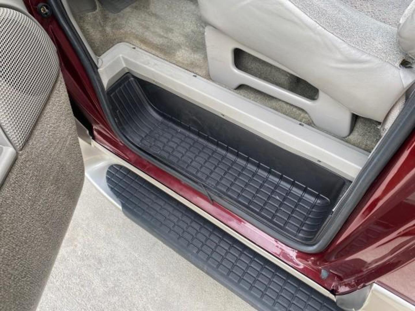 2003 Dark Toreador Red Metallic /Pewter GMC Safari Passenger LOW MILES 34,284 1 OWNER 8 PASSENGER (1GKEL19X13B) with an 4.3L Vortec 4300 V6 MFI Engine engine, Automatic transmission, located at 4701 North Dixie Hwy, Pompano Beach, FL, 33064, (954) 422-2889, 26.240938, -80.123474 - OUR WEBPAGE FLORIDACARS1.COM HAS OVER 100 PHOTOS AND FREE CARFAX LINK 2003 GMC SAFARI 8 PASSENGER AWD 1 OWNER SINCE NEW - ONE OF A KIND FIND VIN: 1GKEL19X13B516237 1 G K E L 1 9 X 1 3 B 5 1 6 2 3 7 VAN 4.3L V6 F OHV 12V GASOLINE 18 MPG ALL WHEEL DRIVE Features 4WD/AWD ABS Brakes Air Conditioning All - Photo#50