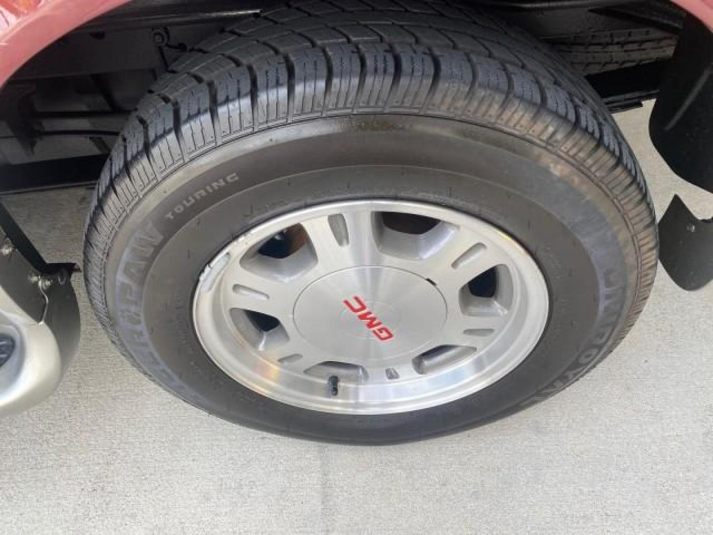 2003 Dark Toreador Red Metallic /Pewter GMC Safari Passenger LOW MILES 34,284 1 OWNER 8 PASSENGER (1GKEL19X13B) with an 4.3L Vortec 4300 V6 MFI Engine engine, Automatic transmission, located at 4701 North Dixie Hwy, Pompano Beach, FL, 33064, (954) 422-2889, 26.240938, -80.123474 - OUR WEBPAGE FLORIDACARS1.COM HAS OVER 100 PHOTOS AND FREE CARFAX LINK 2003 GMC SAFARI 8 PASSENGER AWD 1 OWNER SINCE NEW - ONE OF A KIND FIND VIN: 1GKEL19X13B516237 1 G K E L 1 9 X 1 3 B 5 1 6 2 3 7 VAN 4.3L V6 F OHV 12V GASOLINE 18 MPG ALL WHEEL DRIVE Features 4WD/AWD ABS Brakes Air Conditioning All - Photo#79