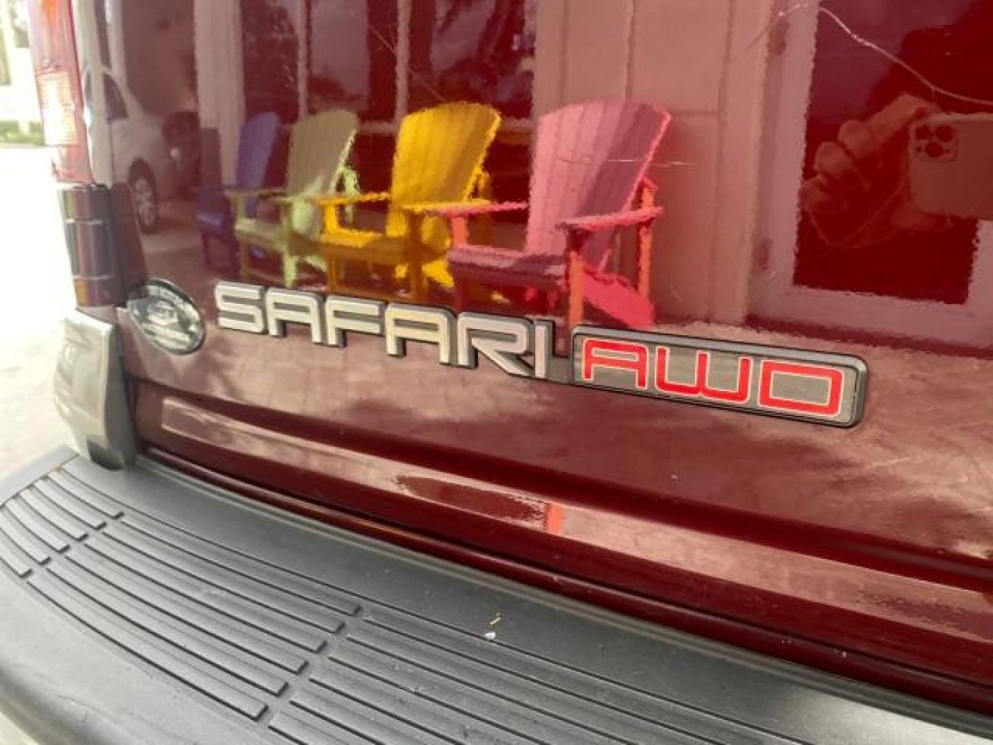 2003 Dark Toreador Red Metallic /Pewter GMC Safari Passenger LOW MILES 34,284 1 OWNER 8 PASSENGER (1GKEL19X13B) with an 4.3L Vortec 4300 V6 MFI Engine engine, Automatic transmission, located at 4701 North Dixie Hwy, Pompano Beach, FL, 33064, (954) 422-2889, 26.240938, -80.123474 - OUR WEBPAGE FLORIDACARS1.COM HAS OVER 100 PHOTOS AND FREE CARFAX LINK 2003 GMC SAFARI 8 PASSENGER AWD 1 OWNER SINCE NEW - ONE OF A KIND FIND VIN: 1GKEL19X13B516237 1 G K E L 1 9 X 1 3 B 5 1 6 2 3 7 VAN 4.3L V6 F OHV 12V GASOLINE 18 MPG ALL WHEEL DRIVE Features 4WD/AWD ABS Brakes Air Conditioning All - Photo#82