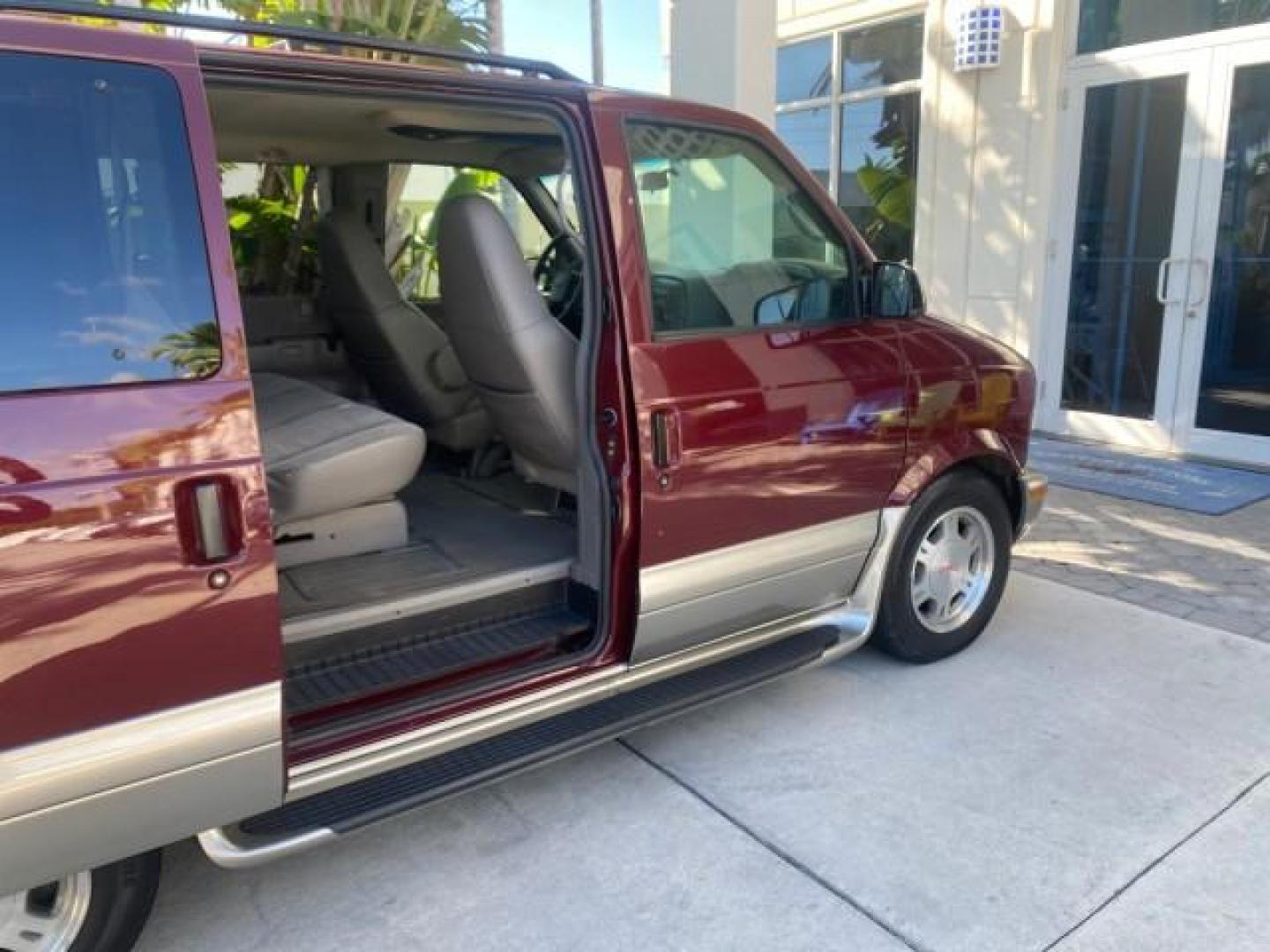 2003 Dark Toreador Red Metallic /Pewter GMC Safari Passenger LOW MILES 34,284 1 OWNER 8 PASSENGER (1GKEL19X13B) with an 4.3L Vortec 4300 V6 MFI Engine engine, Automatic transmission, located at 4701 North Dixie Hwy, Pompano Beach, FL, 33064, (954) 422-2889, 26.240938, -80.123474 - OUR WEBPAGE FLORIDACARS1.COM HAS OVER 100 PHOTOS AND FREE CARFAX LINK 2003 GMC SAFARI 8 PASSENGER AWD 1 OWNER SINCE NEW - ONE OF A KIND FIND VIN: 1GKEL19X13B516237 1 G K E L 1 9 X 1 3 B 5 1 6 2 3 7 VAN 4.3L V6 F OHV 12V GASOLINE 18 MPG ALL WHEEL DRIVE Features 4WD/AWD ABS Brakes Air Conditioning All - Photo#13