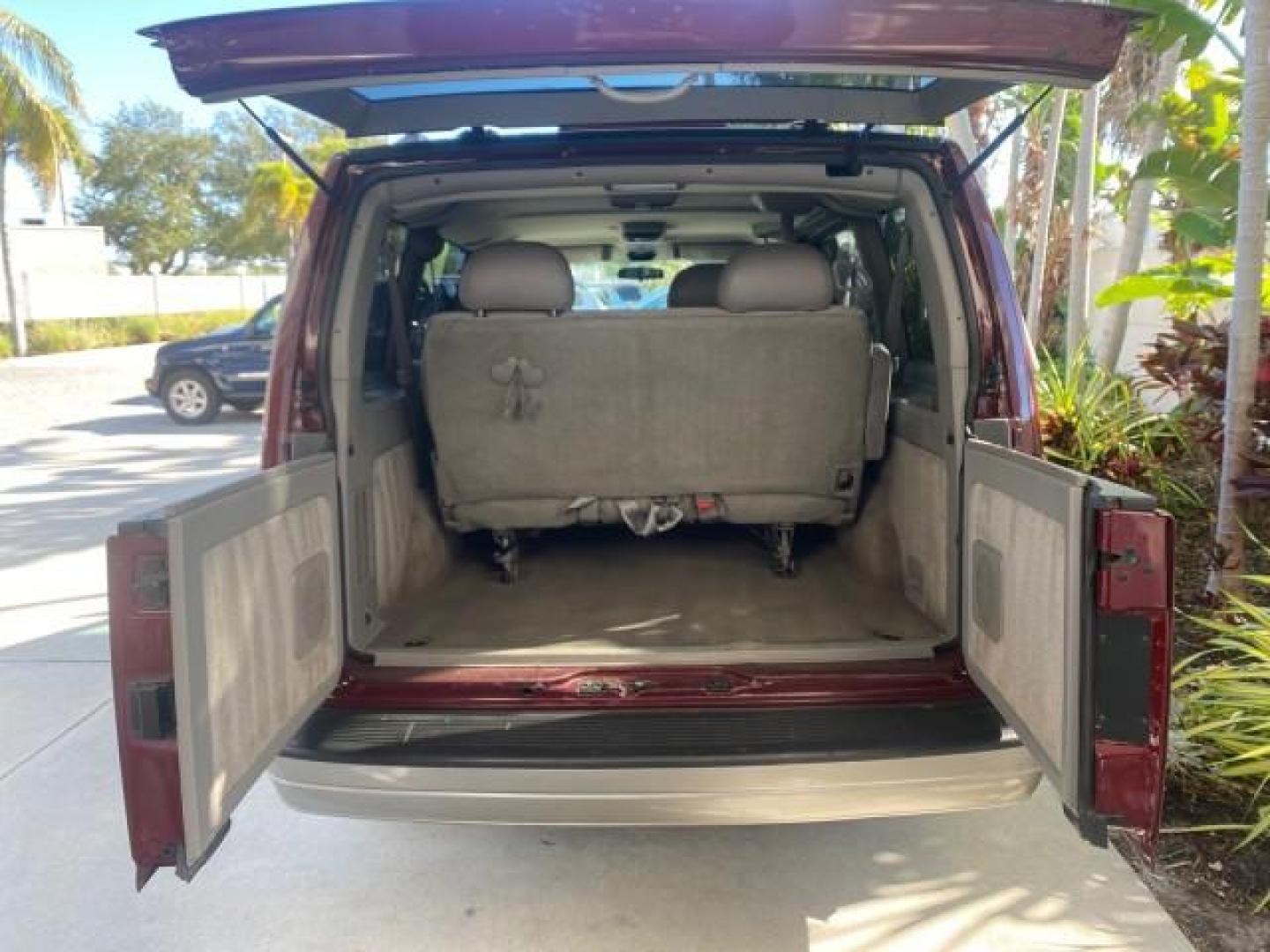 2003 Dark Toreador Red Metallic /Pewter GMC Safari Passenger LOW MILES 34,284 1 OWNER 8 PASSENGER (1GKEL19X13B) with an 4.3L Vortec 4300 V6 MFI Engine engine, Automatic transmission, located at 4701 North Dixie Hwy, Pompano Beach, FL, 33064, (954) 422-2889, 26.240938, -80.123474 - OUR WEBPAGE FLORIDACARS1.COM HAS OVER 100 PHOTOS AND FREE CARFAX LINK 2003 GMC SAFARI 8 PASSENGER AWD 1 OWNER SINCE NEW - ONE OF A KIND FIND VIN: 1GKEL19X13B516237 1 G K E L 1 9 X 1 3 B 5 1 6 2 3 7 VAN 4.3L V6 F OHV 12V GASOLINE 18 MPG ALL WHEEL DRIVE Features 4WD/AWD ABS Brakes Air Conditioning All - Photo#86