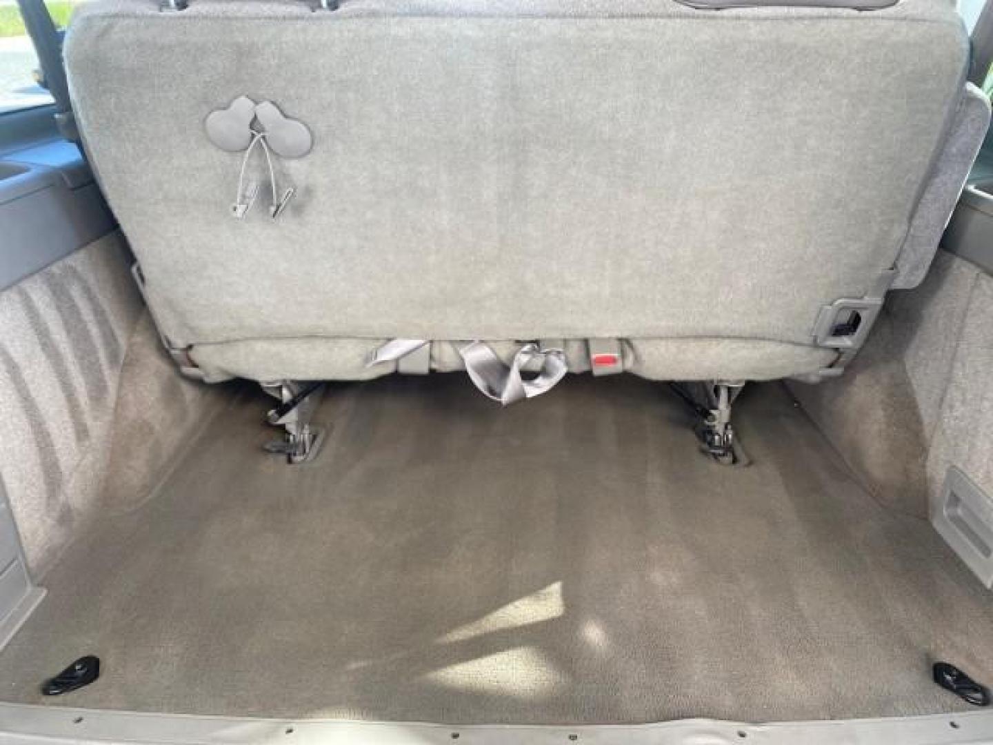 2003 Dark Toreador Red Metallic /Pewter GMC Safari Passenger LOW MILES 34,284 1 OWNER 8 PASSENGER (1GKEL19X13B) with an 4.3L Vortec 4300 V6 MFI Engine engine, Automatic transmission, located at 4701 North Dixie Hwy, Pompano Beach, FL, 33064, (954) 422-2889, 26.240938, -80.123474 - OUR WEBPAGE FLORIDACARS1.COM HAS OVER 100 PHOTOS AND FREE CARFAX LINK 2003 GMC SAFARI 8 PASSENGER AWD 1 OWNER SINCE NEW - ONE OF A KIND FIND VIN: 1GKEL19X13B516237 1 G K E L 1 9 X 1 3 B 5 1 6 2 3 7 VAN 4.3L V6 F OHV 12V GASOLINE 18 MPG ALL WHEEL DRIVE Features 4WD/AWD ABS Brakes Air Conditioning All - Photo#89