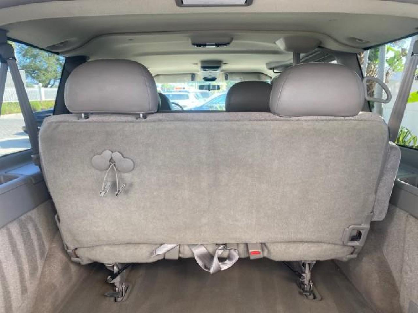 2003 Dark Toreador Red Metallic /Pewter GMC Safari Passenger LOW MILES 34,284 1 OWNER 8 PASSENGER (1GKEL19X13B) with an 4.3L Vortec 4300 V6 MFI Engine engine, Automatic transmission, located at 4701 North Dixie Hwy, Pompano Beach, FL, 33064, (954) 422-2889, 26.240938, -80.123474 - OUR WEBPAGE FLORIDACARS1.COM HAS OVER 100 PHOTOS AND FREE CARFAX LINK 2003 GMC SAFARI 8 PASSENGER AWD 1 OWNER SINCE NEW - ONE OF A KIND FIND VIN: 1GKEL19X13B516237 1 G K E L 1 9 X 1 3 B 5 1 6 2 3 7 VAN 4.3L V6 F OHV 12V GASOLINE 18 MPG ALL WHEEL DRIVE Features 4WD/AWD ABS Brakes Air Conditioning All - Photo#90