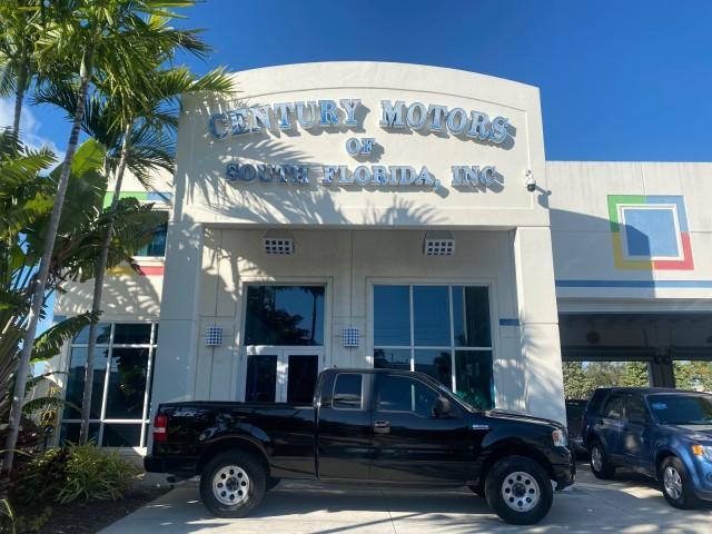 2006 Black /Flint Ford F-150 STX 4 DOOR LOW MILES 92,223 (1FTRX12W56N) with an 4.6L EFI V8 Engine engine, Automatic transmission, located at 4701 North Dixie Hwy, Pompano Beach, FL, 33064, (954) 422-2889, 26.240938, -80.123474 - OUR WEBPAGE FLORIDACARS1.COM HAS OVER 100 PHOTOS AND FREE CARFAX LINK 2006 FORD F-150 XL STX 4 DOOR EXTRA CAB ICE COLD AIR VIN: 1FTRX12W56NA41794 1 F T R X 1 2 W 5 6 N A 4 1 7 9 4 4 DOOR EXTENDED CAB PICKUP 4.6L V8 F GASOLINE 19 MPG REAR WHEEL DRIVE Features ABS Brakes Air Conditioning Alloy Wheels - Photo#0