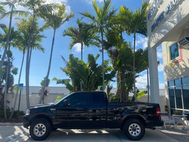 2006 Black /Flint Ford F-150 STX 4 DOOR LOW MILES 92,223 (1FTRX12W56N) with an 4.6L EFI V8 Engine engine, Automatic transmission, located at 4701 North Dixie Hwy, Pompano Beach, FL, 33064, (954) 422-2889, 26.240938, -80.123474 - OUR WEBPAGE FLORIDACARS1.COM HAS OVER 100 PHOTOS AND FREE CARFAX LINK 2006 FORD F-150 XL STX 4 DOOR EXTRA CAB ICE COLD AIR VIN: 1FTRX12W56NA41794 1 F T R X 1 2 W 5 6 N A 4 1 7 9 4 4 DOOR EXTENDED CAB PICKUP 4.6L V8 F GASOLINE 19 MPG REAR WHEEL DRIVE Features ABS Brakes Air Conditioning Alloy Wheels - Photo#31