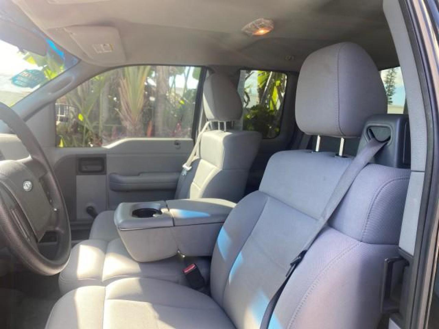 2006 Black /Flint Ford F-150 STX 4 DOOR LOW MILES 92,223 (1FTRX12W56N) with an 4.6L EFI V8 Engine engine, Automatic transmission, located at 4701 North Dixie Hwy, Pompano Beach, FL, 33064, (954) 422-2889, 26.240938, -80.123474 - OUR WEBPAGE FLORIDACARS1.COM HAS OVER 100 PHOTOS AND FREE CARFAX LINK 2006 FORD F-150 XL STX 4 DOOR EXTRA CAB ICE COLD AIR VIN: 1FTRX12W56NA41794 1 F T R X 1 2 W 5 6 N A 4 1 7 9 4 4 DOOR EXTENDED CAB PICKUP 4.6L V8 F GASOLINE 19 MPG REAR WHEEL DRIVE Features ABS Brakes Air Conditioning Alloy Wheels - Photo#45