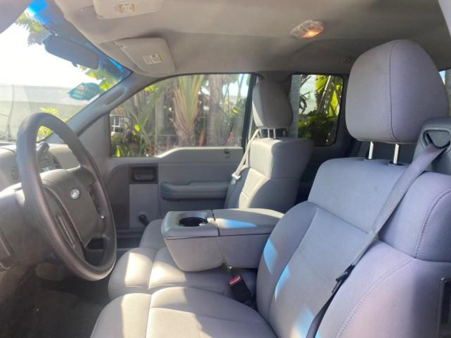 2006 Black /Flint Ford F-150 STX 4 DOOR LOW MILES 92,223 (1FTRX12W56N) with an 4.6L EFI V8 Engine engine, Automatic transmission, located at 4701 North Dixie Hwy, Pompano Beach, FL, 33064, (954) 422-2889, 26.240938, -80.123474 - OUR WEBPAGE FLORIDACARS1.COM HAS OVER 100 PHOTOS AND FREE CARFAX LINK 2006 FORD F-150 XL STX 4 DOOR EXTRA CAB ICE COLD AIR VIN: 1FTRX12W56NA41794 1 F T R X 1 2 W 5 6 N A 4 1 7 9 4 4 DOOR EXTENDED CAB PICKUP 4.6L V8 F GASOLINE 19 MPG REAR WHEEL DRIVE Features ABS Brakes Air Conditioning Alloy Wheels - Photo#46